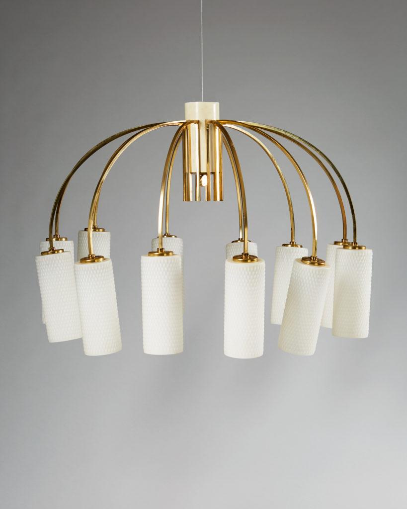 Ceiling lamp anonymous,
Denmark 1960s.

Brass and glass.

Bought from Illums Bolighus, Copenhagen.

Diameter: 65 cm/ 2' 2''
Height: 60 cm/ 2'

Diameter of the shades: 9 cm/ 3 3/4''
Height of the shades: 22 cm/ 8 3/4''
 