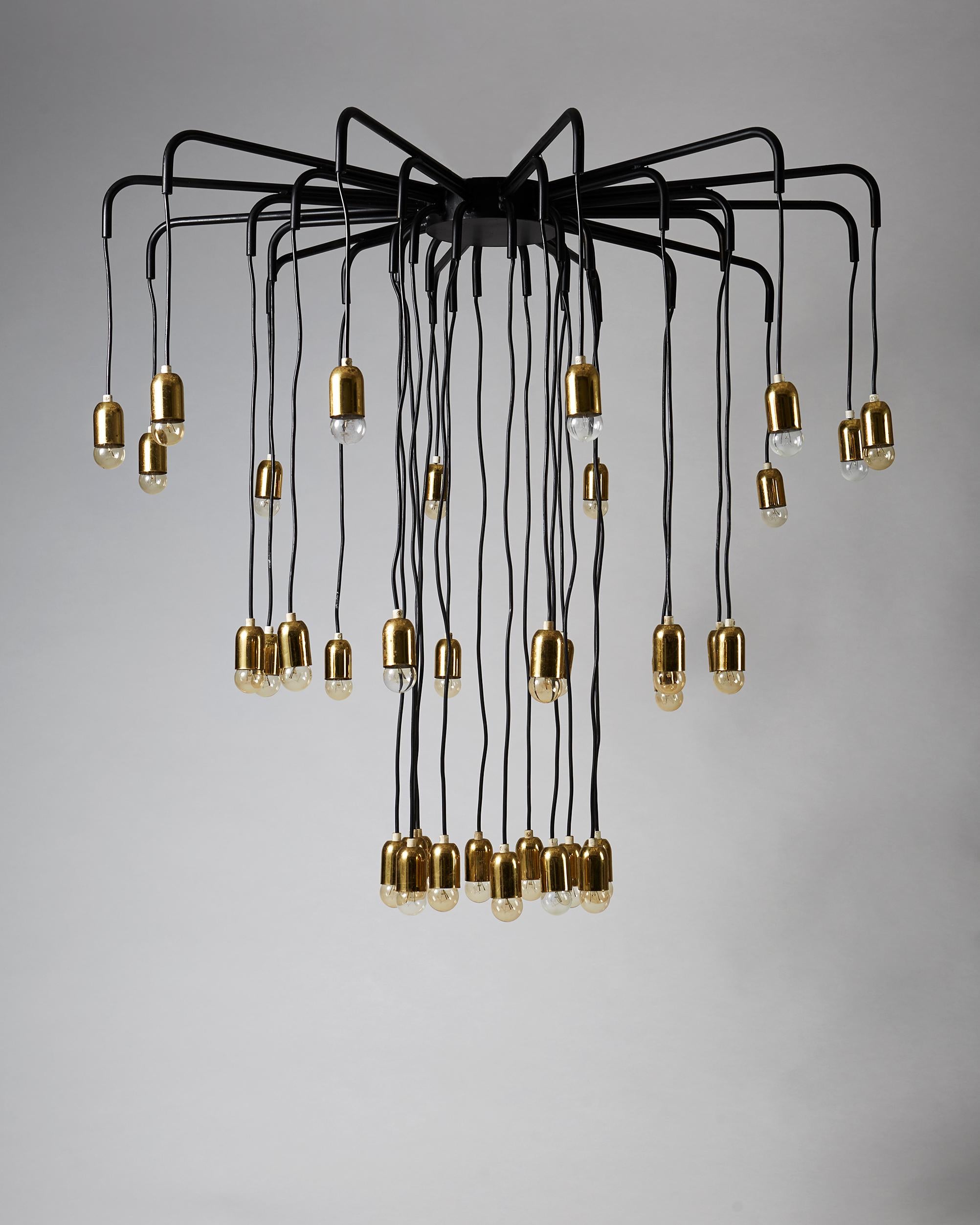 Brass and steel. 

Height: 100 cm/ 3' 3 3/8