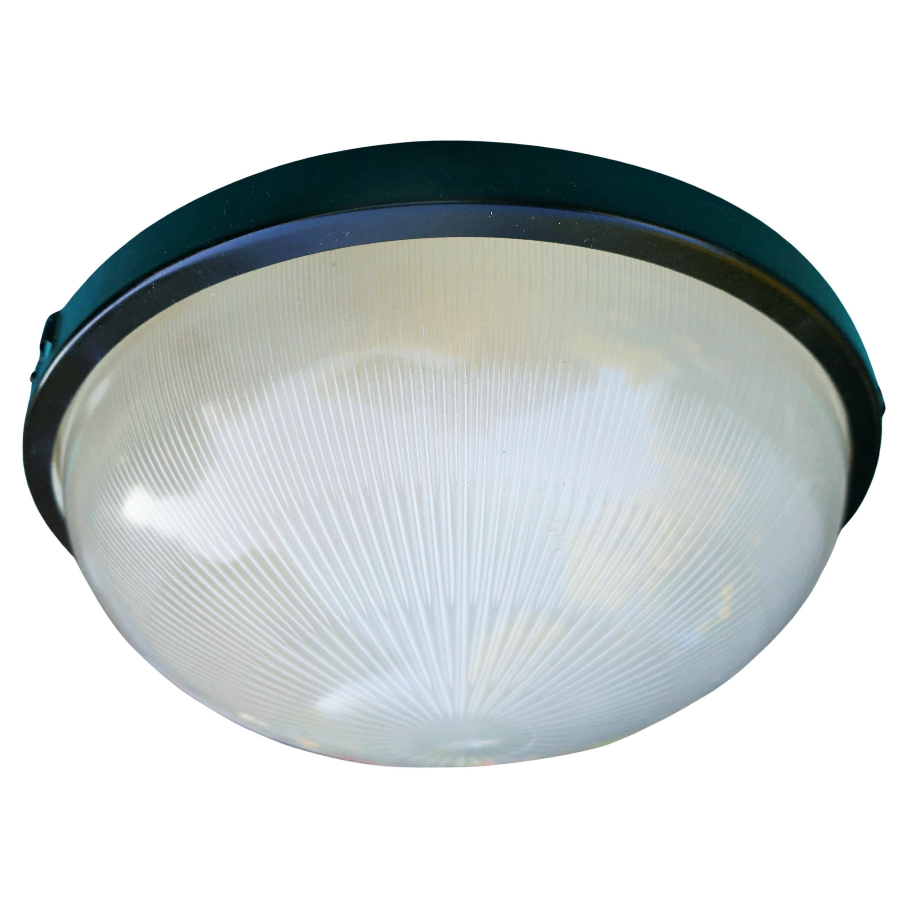 Ceiling or wall light attributed to Sergio Mazza for Artemide.
One lamp, as shown in the photo, has a defect and will be sold last.
The glass diffuser is white.
There are no screws, but the bayonet fastening is a standard one.
Good condition.
Thank