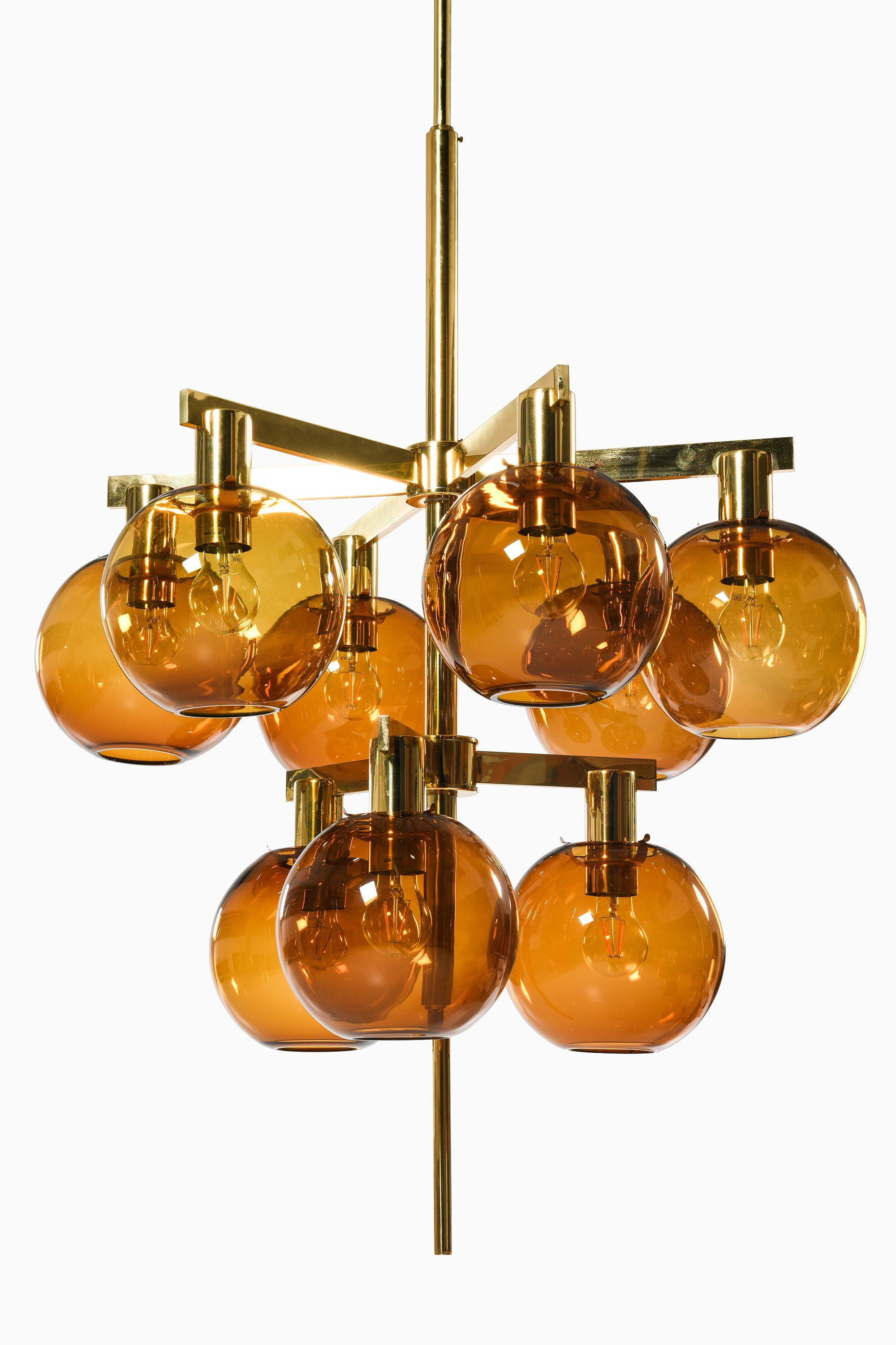 Ceiling Lamp in Brass and Amber Glass by Hans-Agne Jakobsson, 1950's

Additional Information:
Material: Brass and amber glass
Style: Mid century, Scandinavian
Rare ceiling lamp model T 348/9
Produced by Hans-Agne Jakobsson AB in Markaryd,