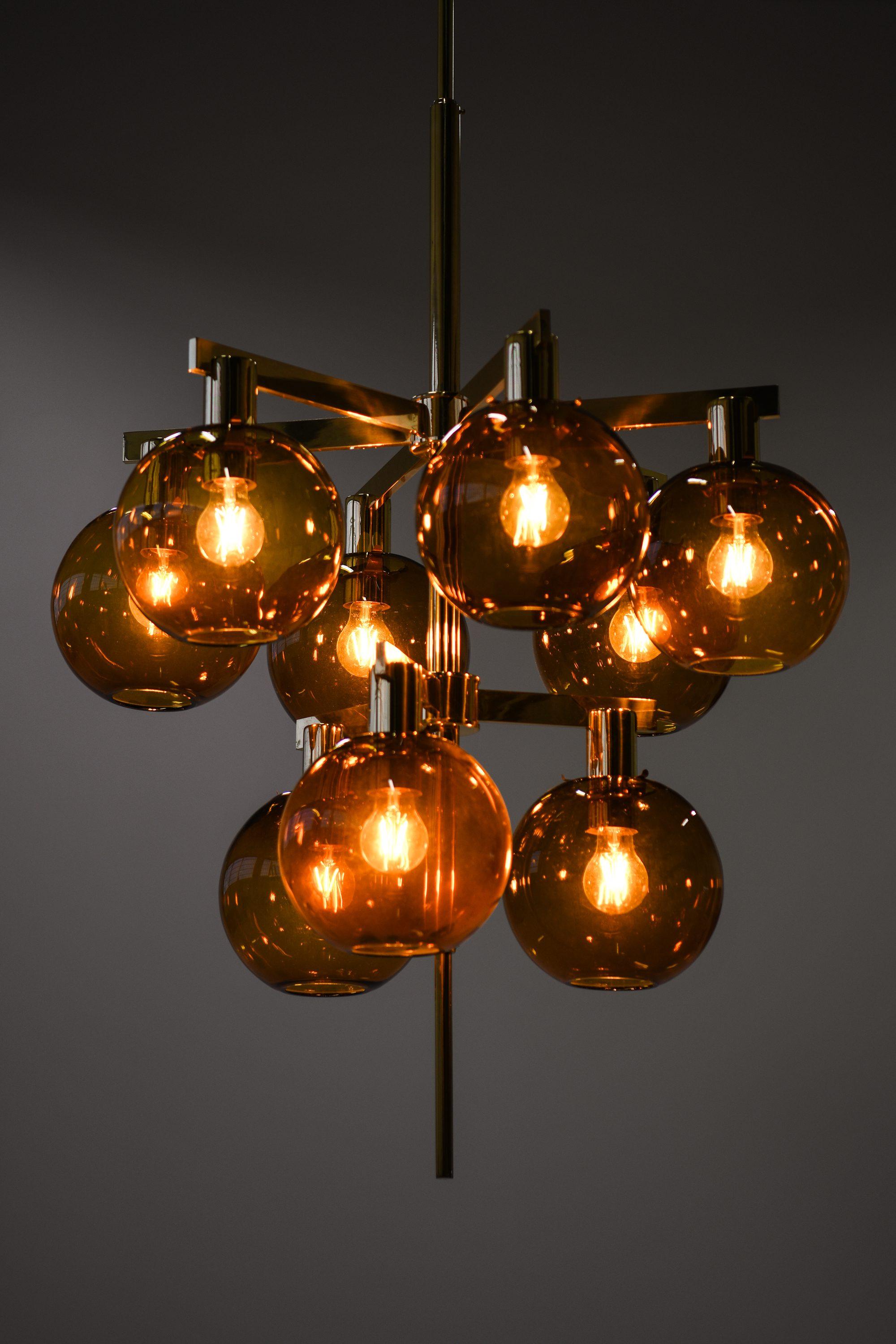 20th Century Ceiling Lamp Chandelier in Brass and Amber Glass by Hans-Agne Jakobsson, 1950's For Sale