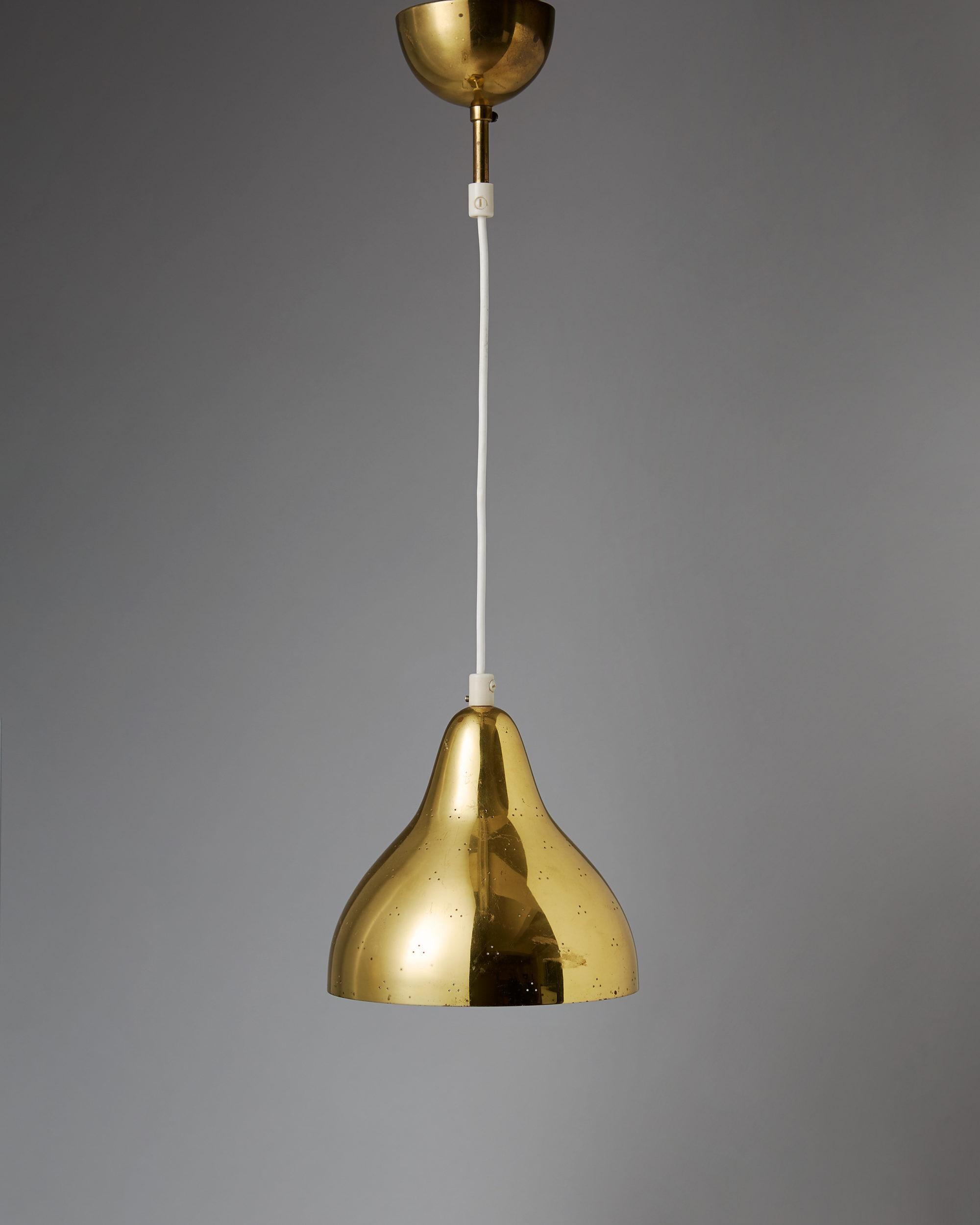 Ceiling lamp designed by Lisa Johansson-Pape, Finland, 1950s. Polished pierced brass.
 