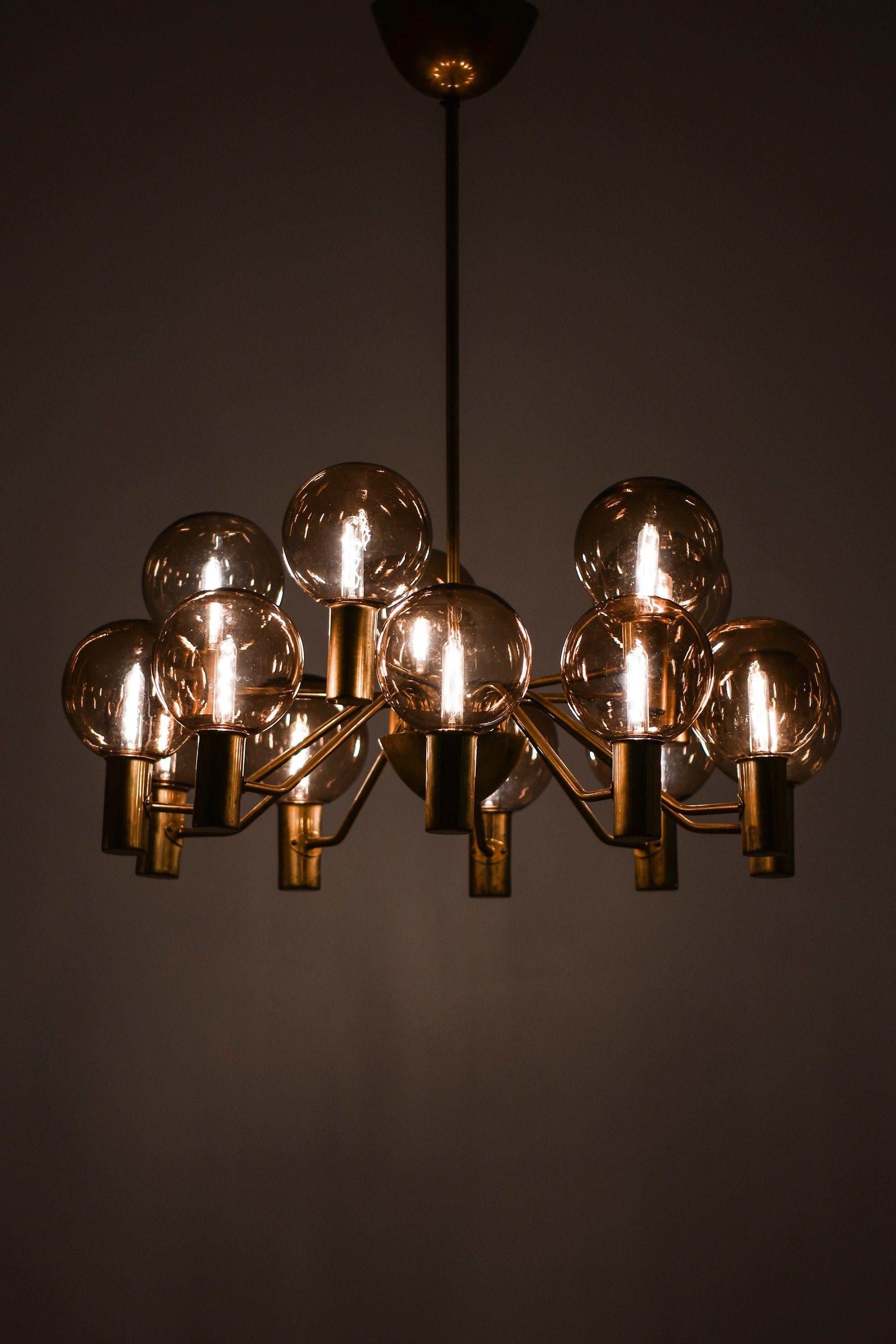 Ceiling Lamp in Brass and Glass by Hans-Agne Jakobsson, 1950's

Additional Information:
Material: Brass and glass
Style: Mid century, Scandinavia
Rare ceiling lamp model T-372/15
Produced by Hans-Agne Jakobsson AB in Markaryd, Sweden
Dimensions (W x