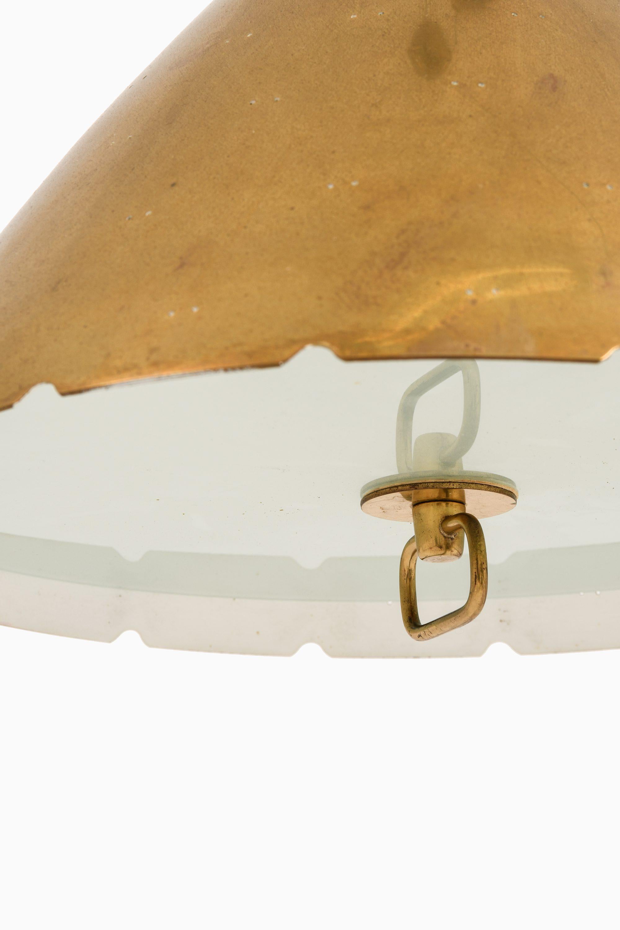 Scandinavian Modern Ceiling Lamp in Brass and Glass by Paavo Tynell, 1950's For Sale