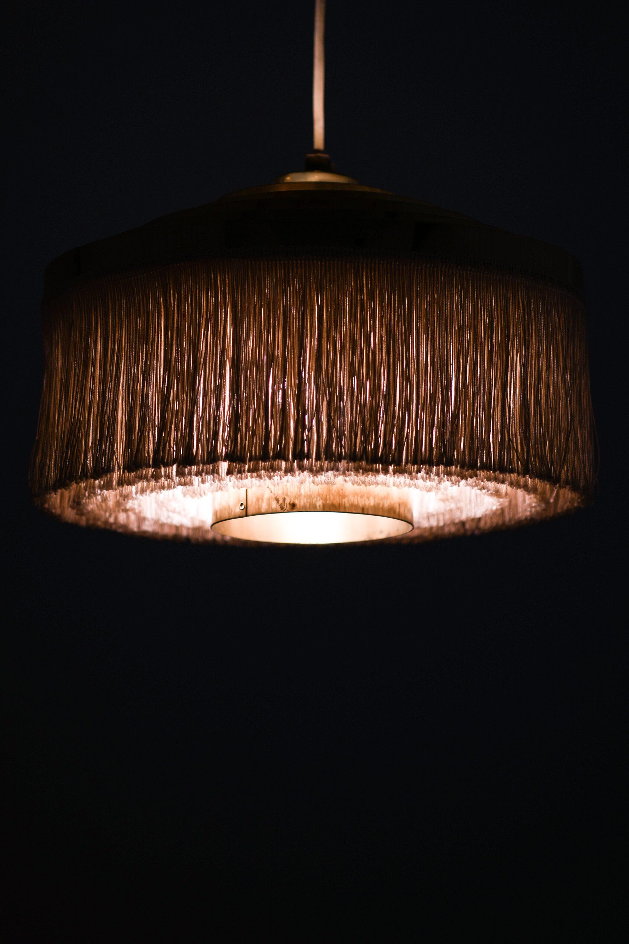 Swedish Ceiling Lamp in Brass and Silk Fringes by Hans-Agne Jakobsson, 1950's For Sale