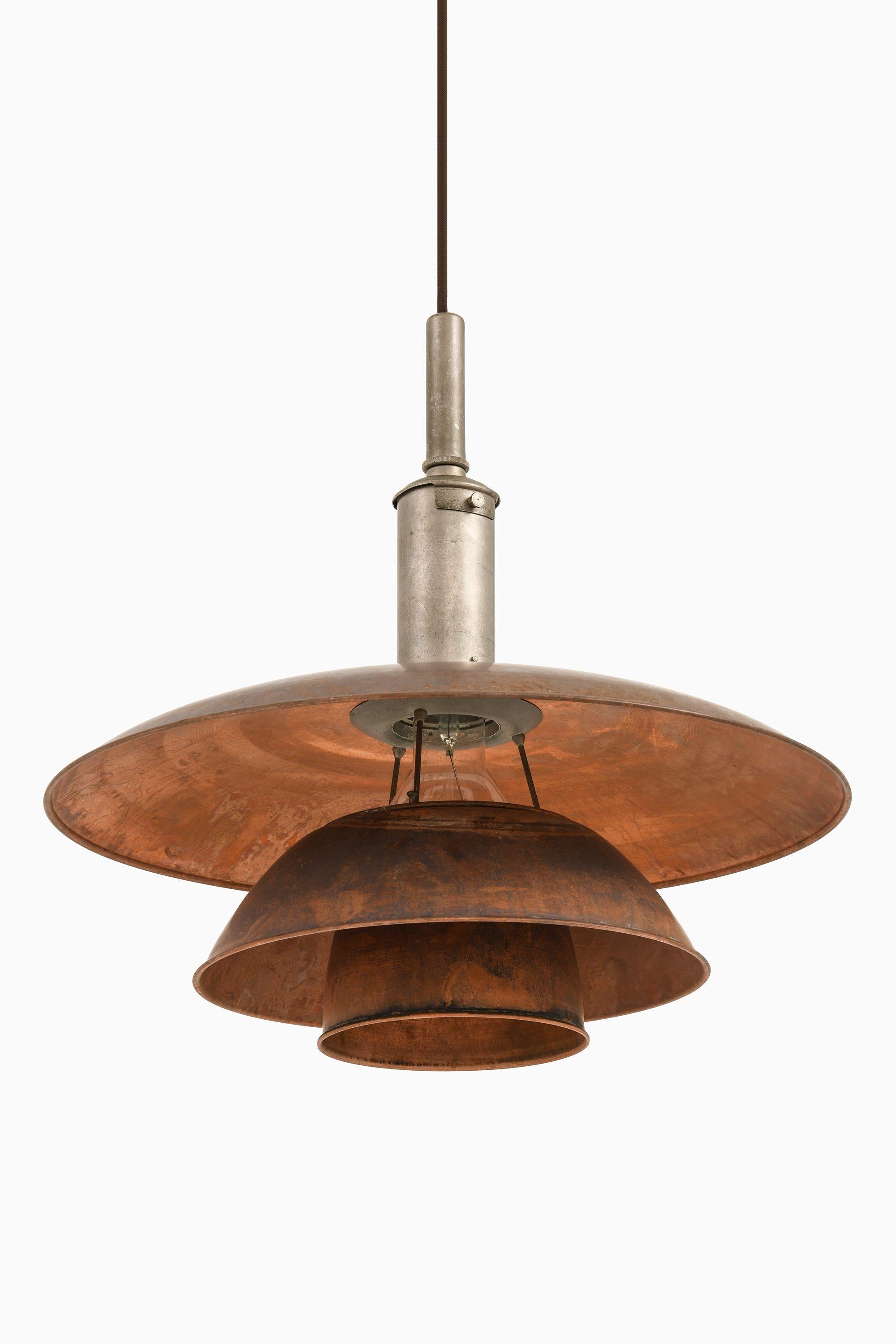 Ceiling Lamp in Copper and Nickel Plated Steel by Poul Henningsen, 1920's

Additional Information:
Material: Copper, nickel plated steel
Style: Mid century, Scandinavian
Rare ceiling lamp model PH-5300
Produced by Louis Poulsen in Denmark
Dimensions