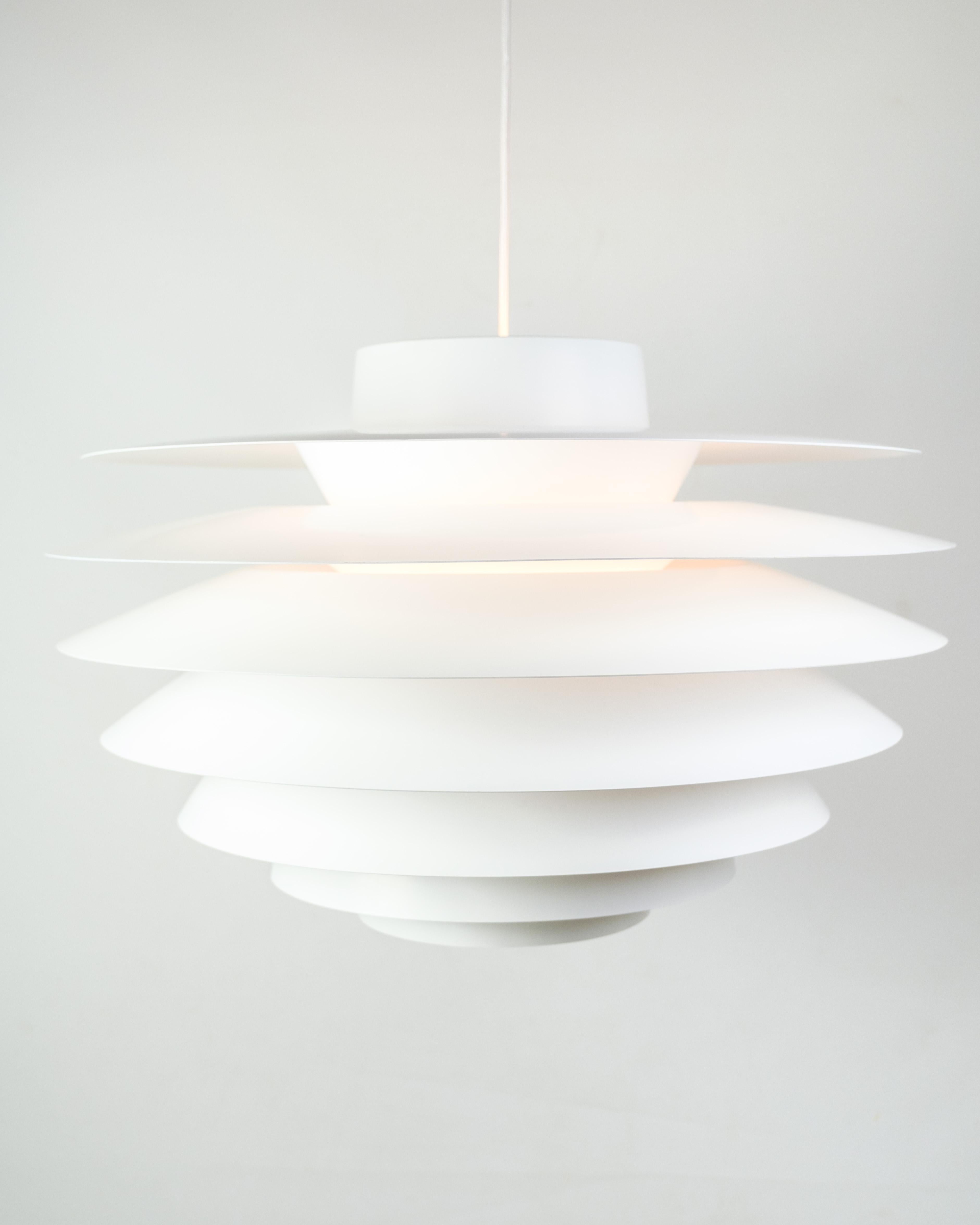 Oval ceiling lamp designed by the renowned Sven Middelboe and produced by Thorn, carries elegance and timeless beauty with its unique design. Created with care and precision, this lamp, known as the Verona model, is a masterpiece from the 1990s era