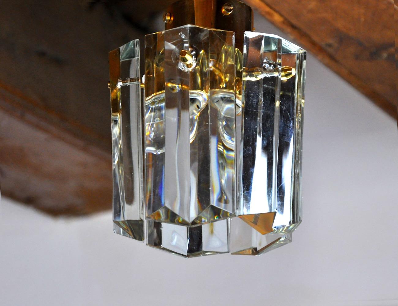 Very nice little kinkeldey ceiling light designed and produced in germany in the 70s, we have two units. Structure in gilded brass composed of cut crystals with marks of time consistent with its seniority. Rare design object that will illuminate