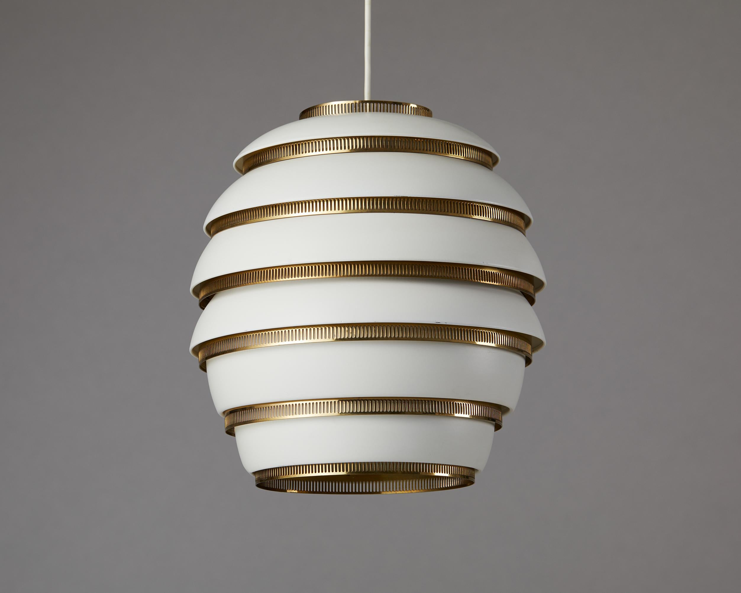 Ceiling lamp model A332 “Beehive” designed by Alvar Aalto for Valaistustyo,
Finland, 1953.

Painted aluminium and polished brass.

Early six tier version.

Stamped, 'VAlAISTUSTYO A33 A'

Dimensions:
H: 34 cm / 13 1/3’’
Diameter: 32 cm / 12 1/2’’
    