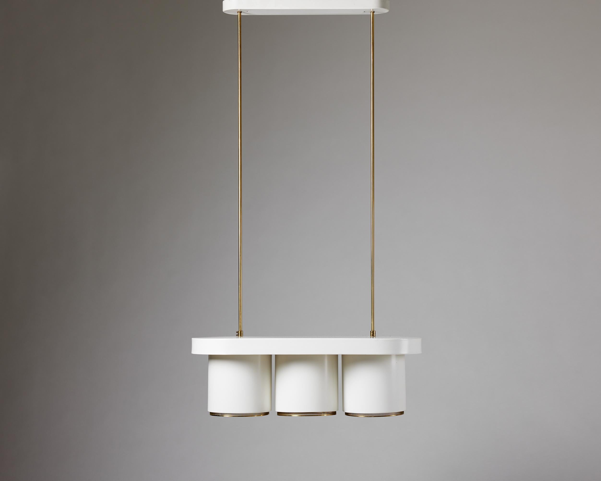 Ceiling lamp, model A203, designed by Alvar Aalto for Valaistustyö,
Finland, 1940s.

Lacquered metal and brass.

H: 123 cm / 4' 1/4''
Height of pendant: 20 cm / 8''
W: 68.5 cm / 2' 3
