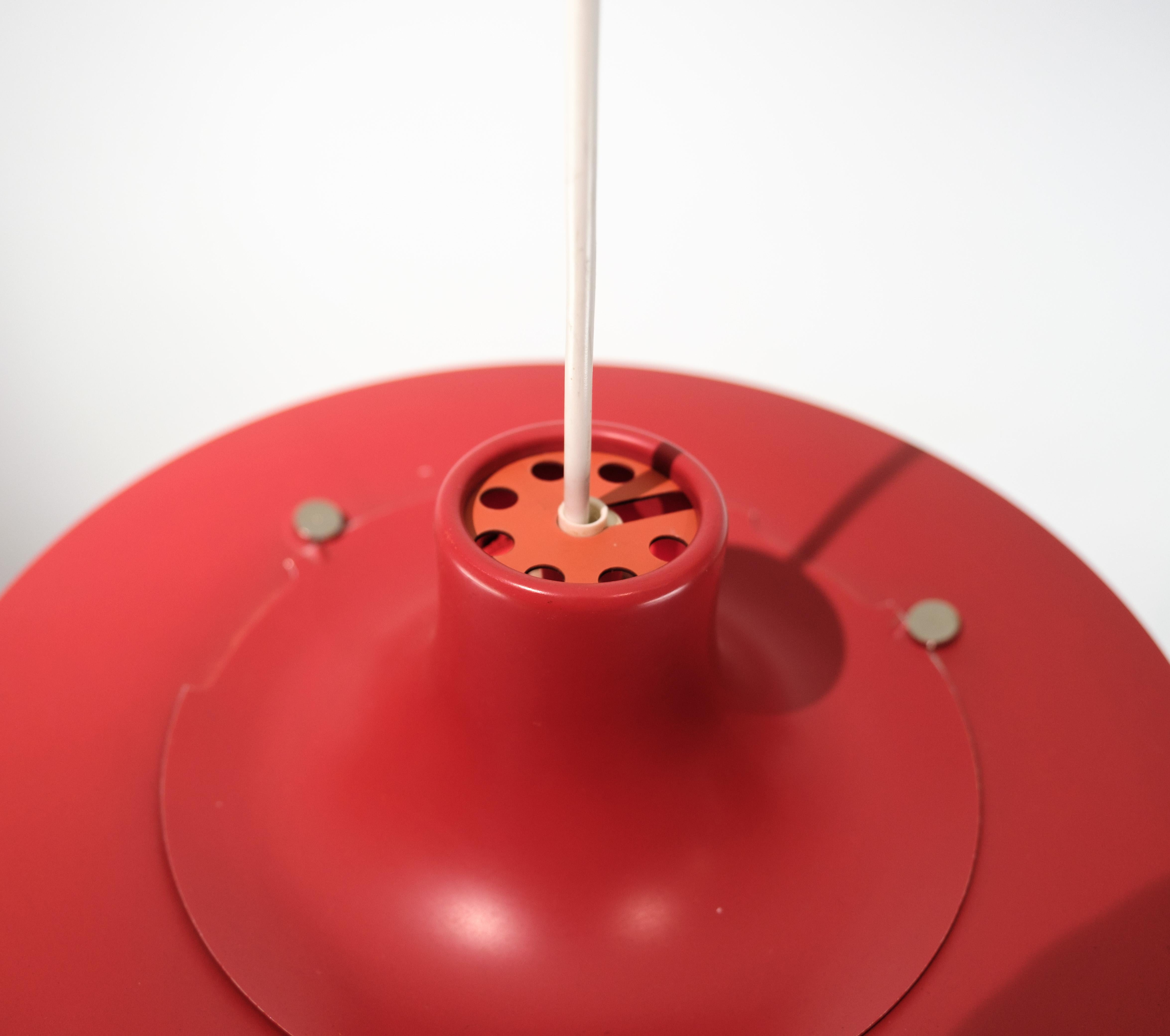 Ceiling lamp, model PH5, designed by Poul Henningsen in 1958. The lamp is in the colors red and blue. The light source used is 75W E27. The material is Aluminum. It is in good used condition.

This product will be inspected thoroughly at our