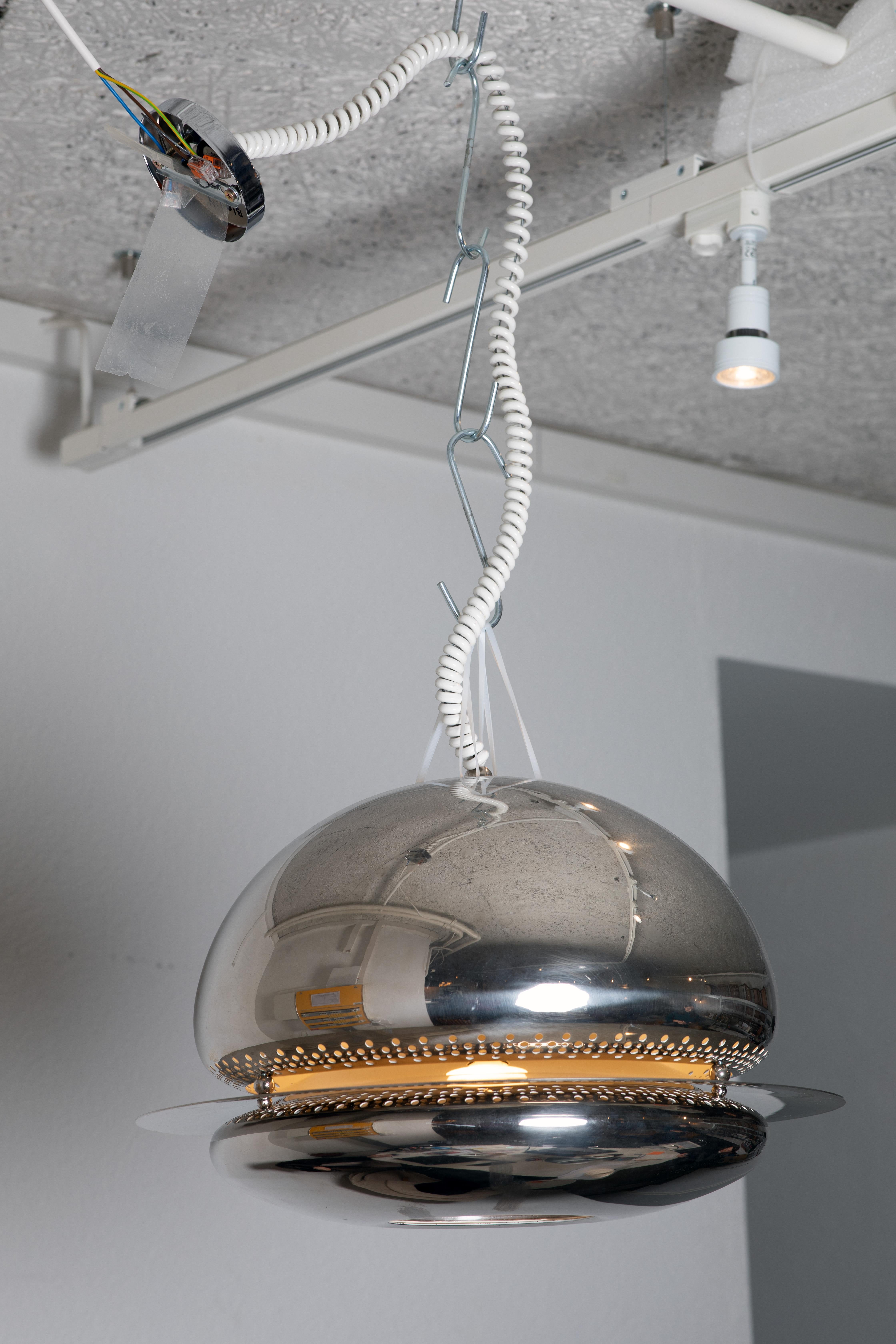 The Ceiling Lamp Nictea is an iconic design by Afra and Tobia Scarpa, created in 1961 and produced by the renowned brand Flos. This exceptional light fixture is a testament to the clean, minimalist style that emerged in mid-20th-century design. The