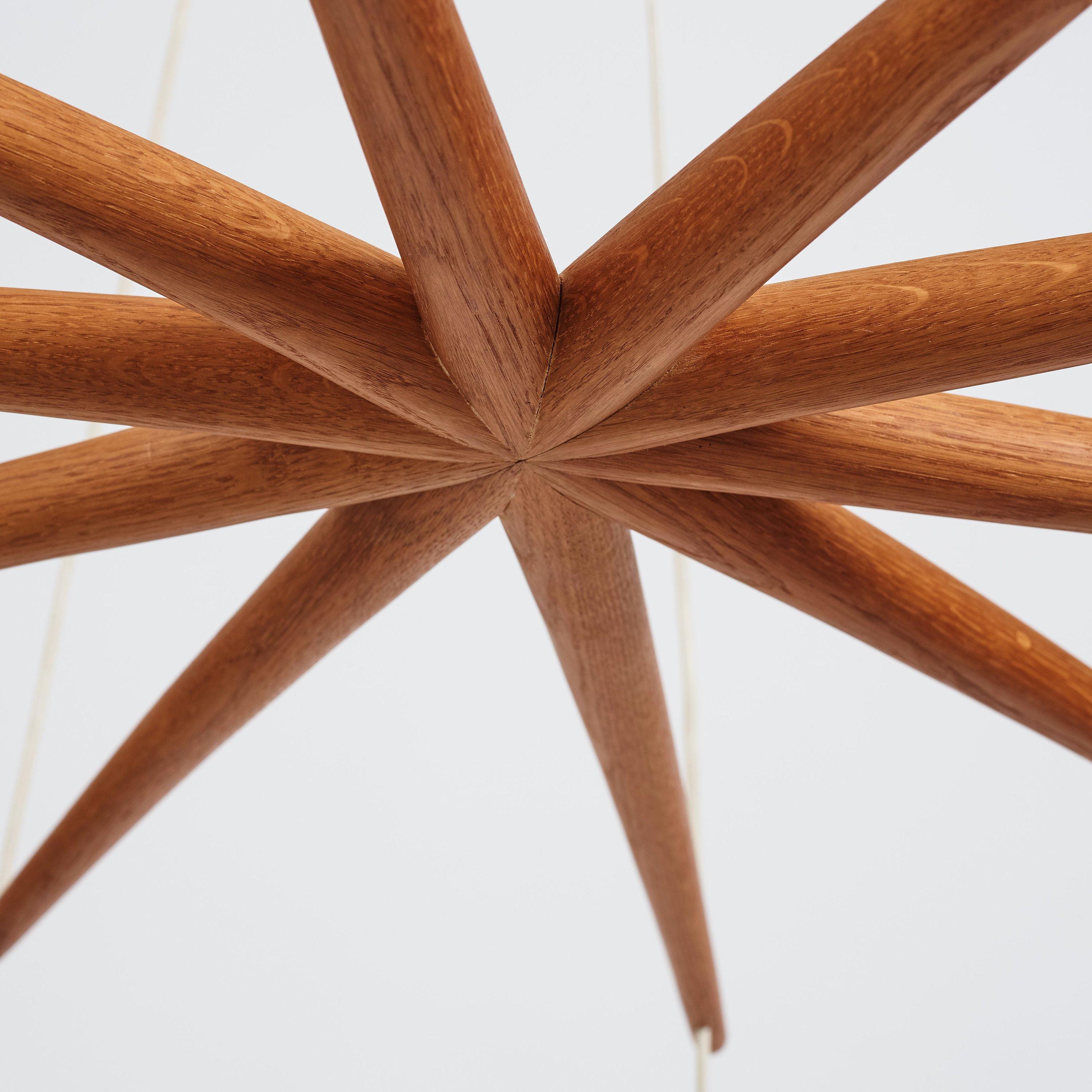 Ceiling Lamp Oak 10 Arm by Uno & Östen Kristiansson Luxus, Vittsjö, Sweden 1950s

This amazing Oak ceiling lamp consists of 10 arms in a large star pattern with 10 original opaline globes hanging below.

THis iconic ceiling lamp was created by
