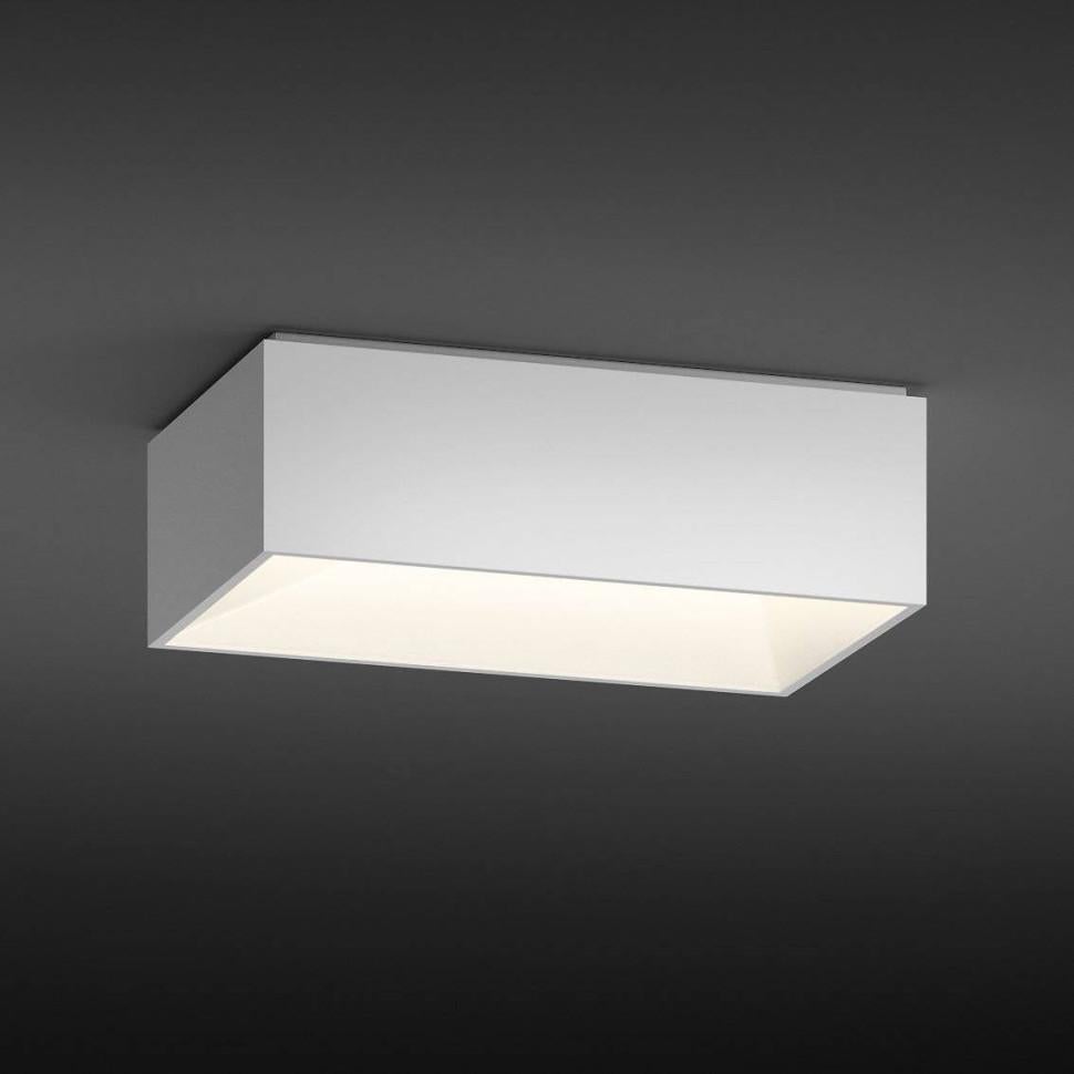 La collection de luminaires Link de Vibia, conçue par Ramón Esteve, redéfinit le concept d'éclairage architectural. Avec ses volumes géométriques épurés, Link s'intègre parfaitement aux plafonds et aux murs, donnant l'impression que la lumière