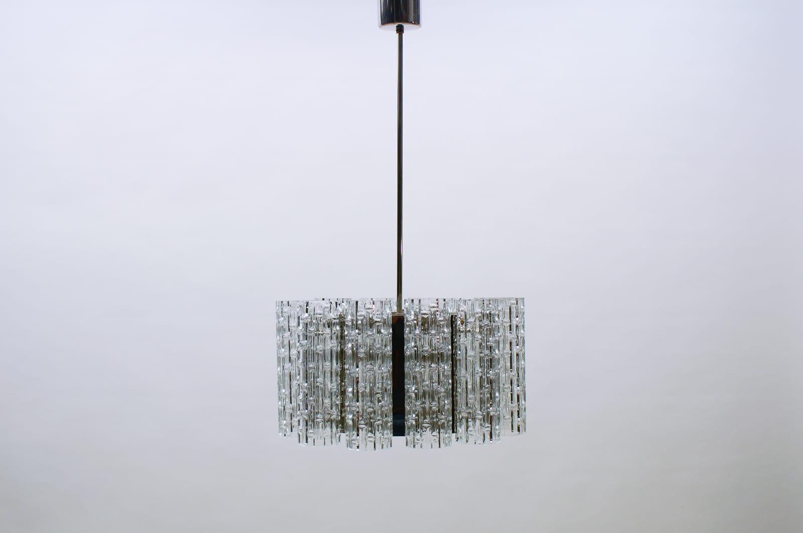 Elegant chandelier produced in Germany in the 1960s. The lamp has its original wiring and requires 12x E14 Edison screw fit bulbs.