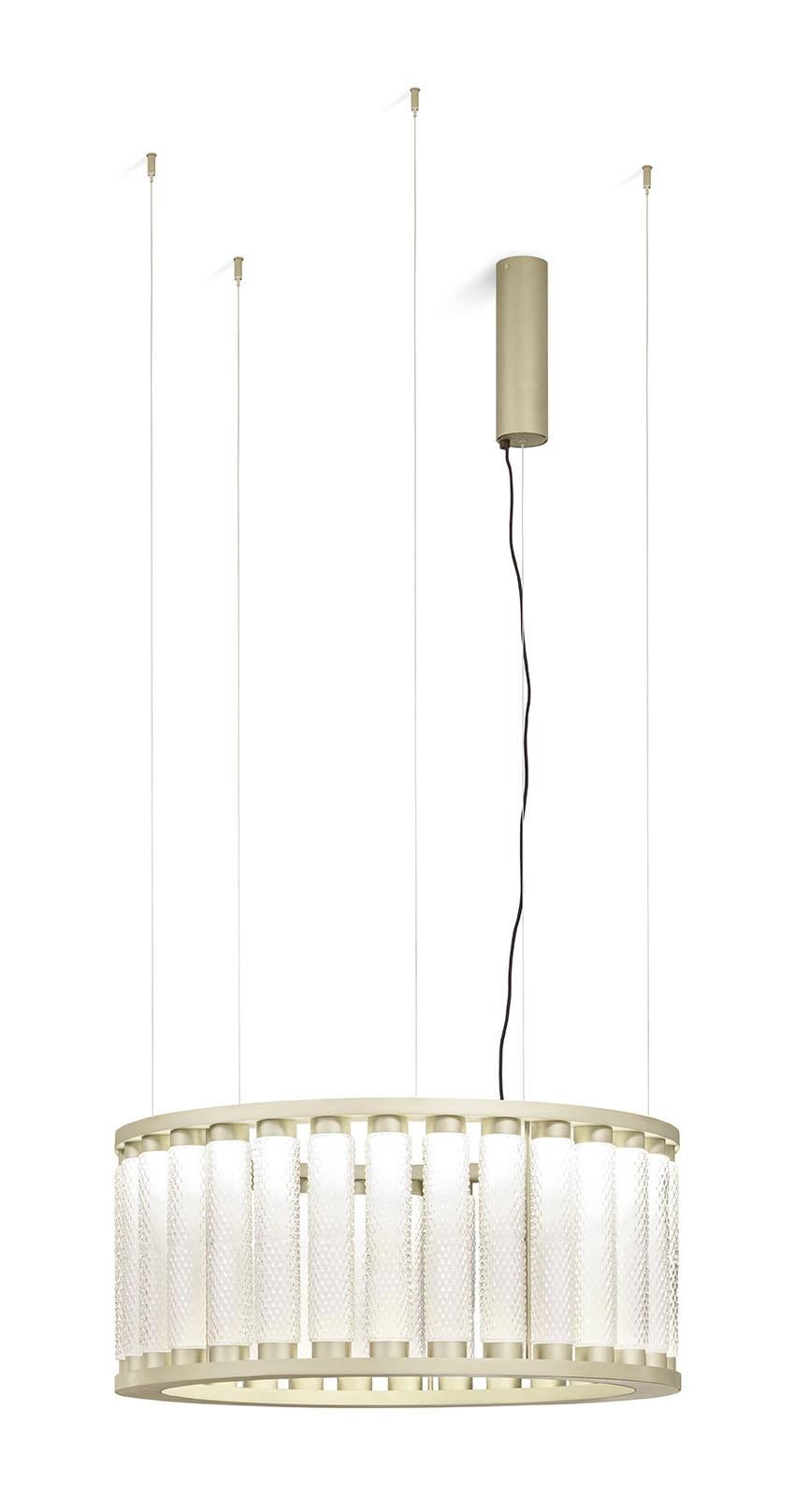 The Bohème ceiling lamp is characterised by its decorative Murano glass tubes, cleverly arranged on a metal frame with a sophisticated finish.

 This exclusive design combines versatility and sophistication, making it ideal for a variety of