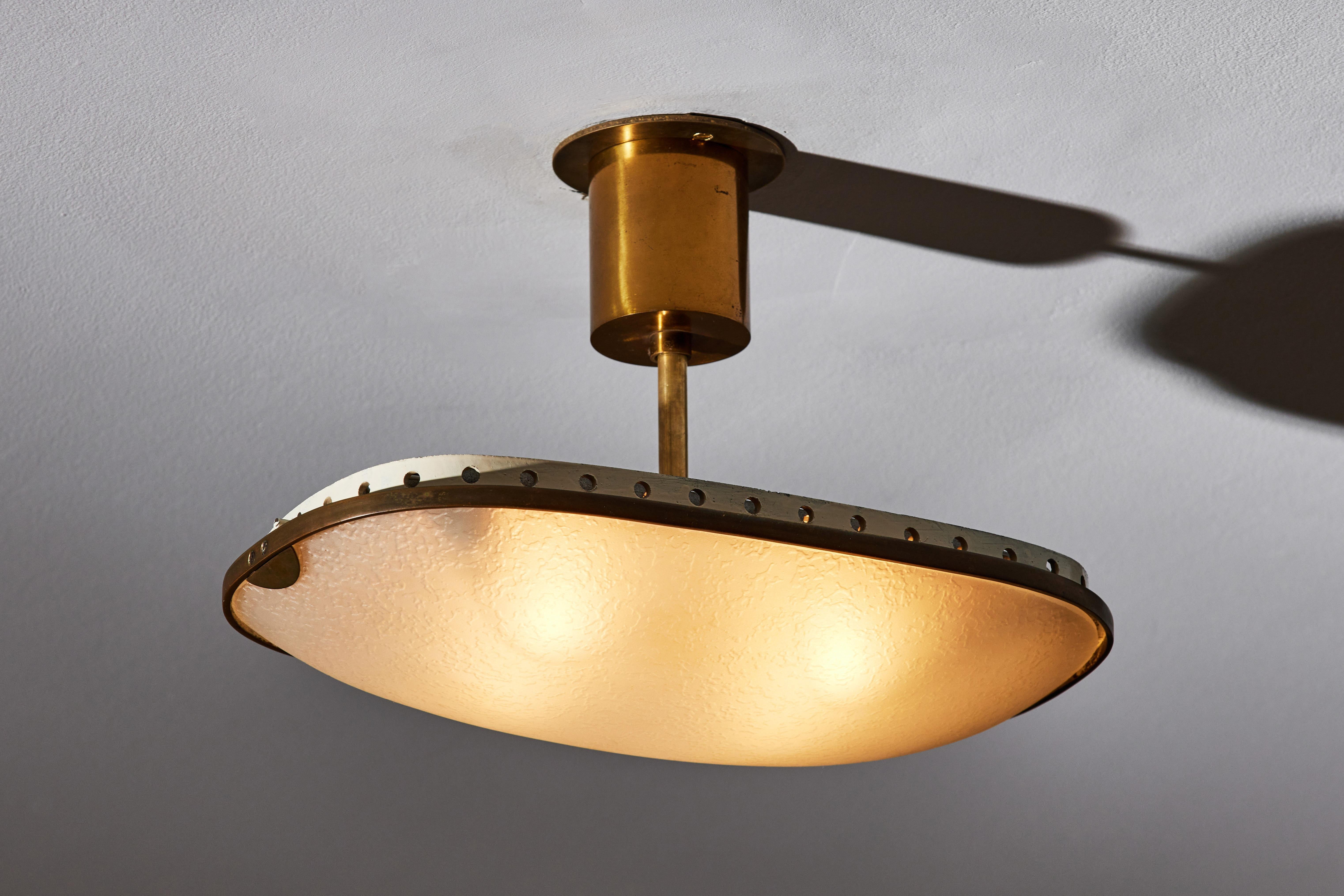 Ceiling light by Fontana Arte. Manufactured in Italy, circa 1950s. Textured glass, brass, painted metal. Custom brass backplate. Wired for US standards. We recommend four E14 40w maximum bulbs. Bulbs provided as a onetime courtesy.