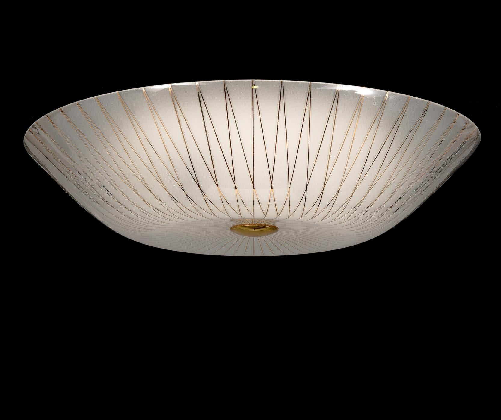 A ceiling light designed by Lisa Johansson-Pape, Model 71-005' Manufactured by Orno, Finland Circa 1950th.

Frosted glass shade with gilded decorations. For three lights. Manufacturer label. Diameter 55 cm.

Rewiring available upon request.
 