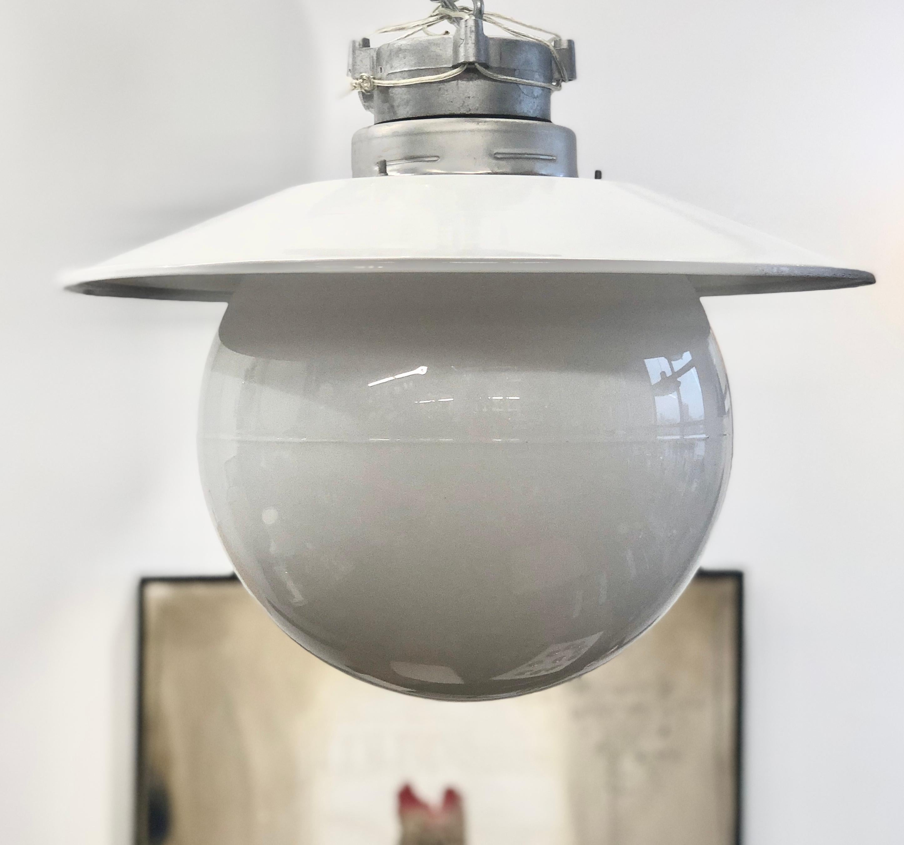 Flush mount outdoor  light designed by Paavo Tynell for Idman Oy, Model H10-100. Finland, circa 1950th. Large glass bawl with metal mount. Can be modified for mount on hanging rod. Marked by manufacturer. Glass shade diameter 12