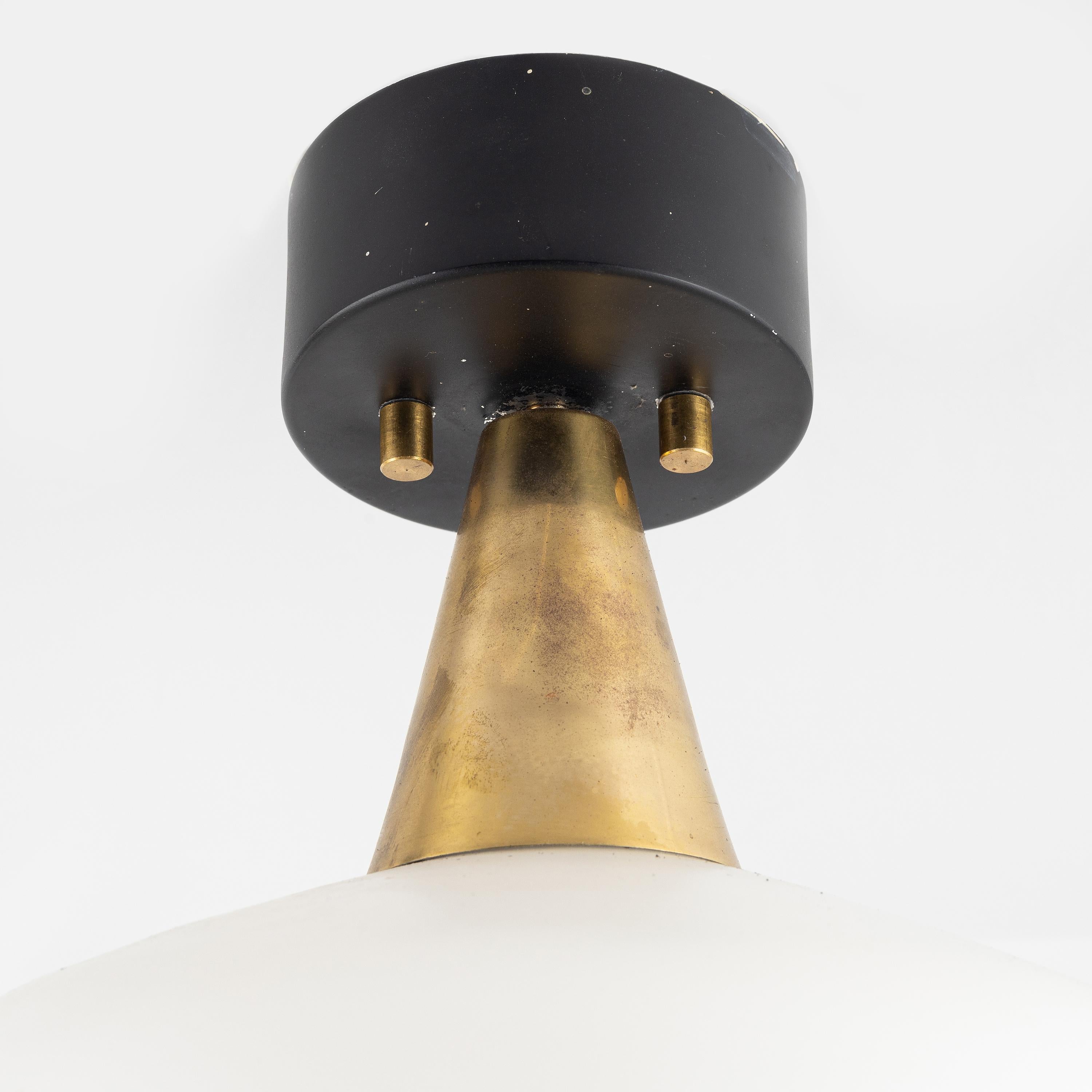 Brass and glass opalin ceiling light in th style of Lisa Johansson-Pape made in Sweden around 1950.
Minor wear, electrical function not tested
A pair available price for 1 item.
