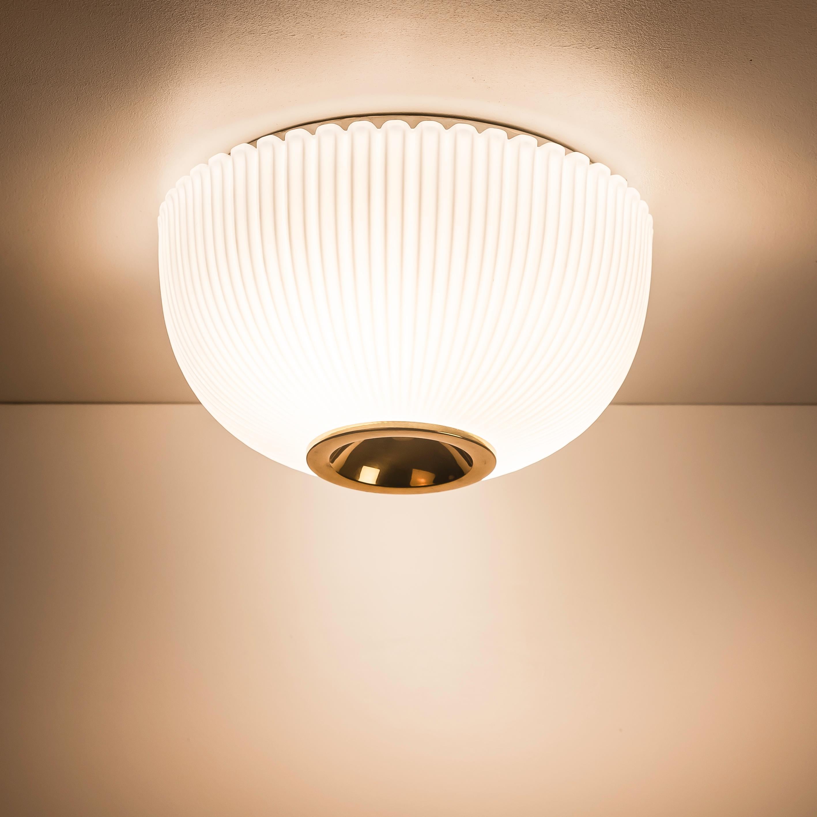Investing in this Ceiling Light from Limburg, Germany, dating back to the 1970s, offers a unique opportunity to bring a blend of timeless design and quality craftsmanship into your space. Limburg, renowned for its exceptional glasswork, showcases