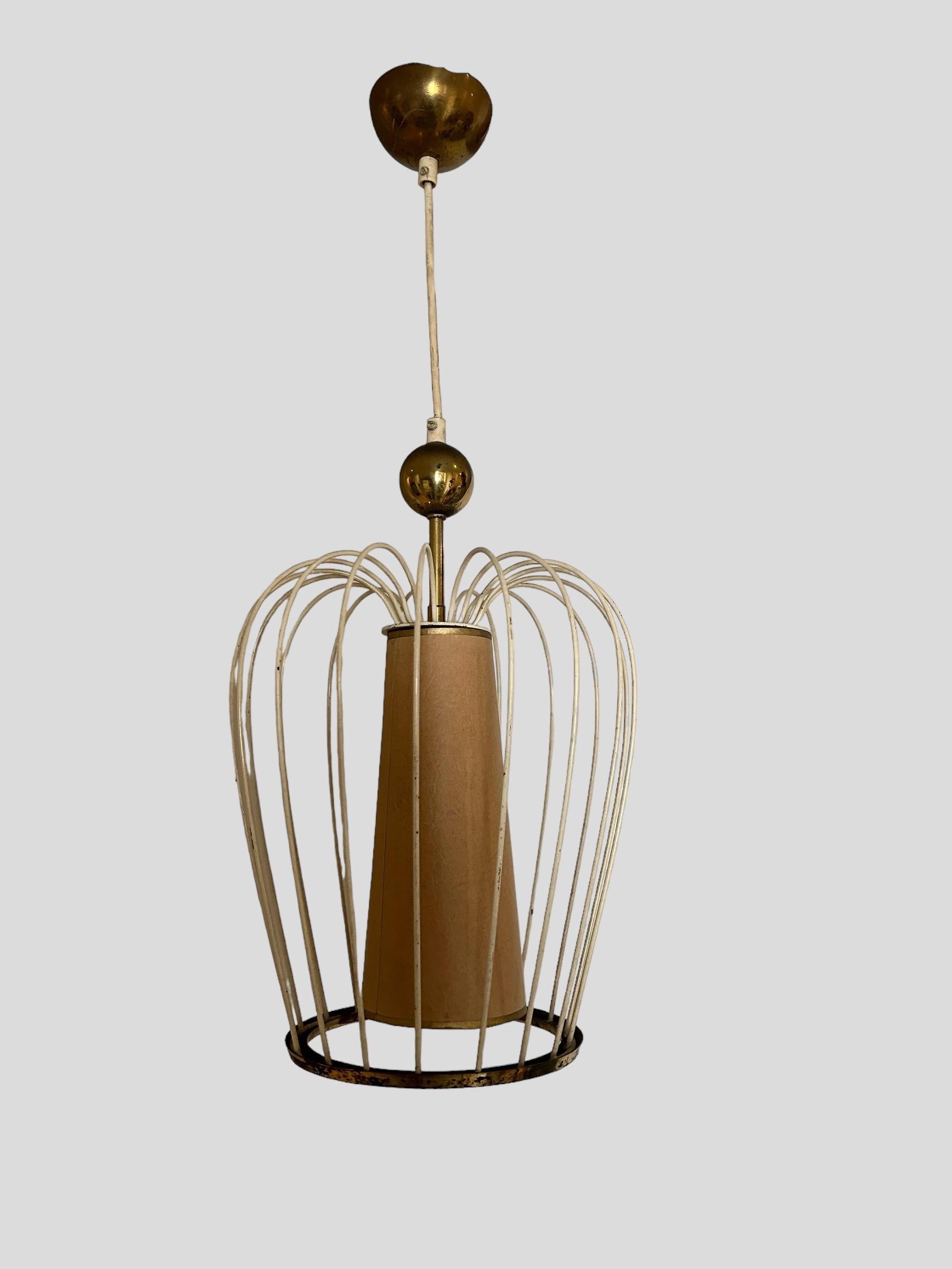 Beautiful ceiling light with metal cage and paper reflector, brass elements.
Original condition from the 1950's
Model close to the work of Jean Royére