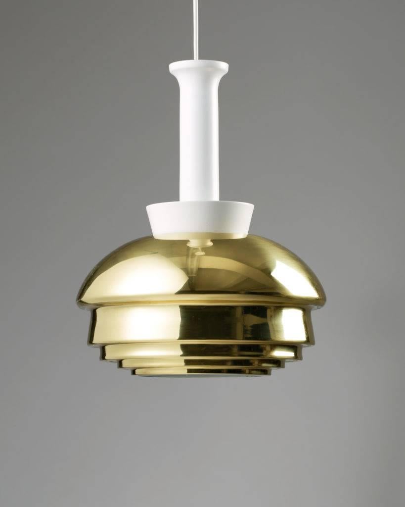 Ceiling light model A 335 designed by Alvar Aalto for Valaisinpaja Oy, 
Finland, 1952.

Brass and lacquered metal.

Height of the shade: 40 cm/ 15 3/4