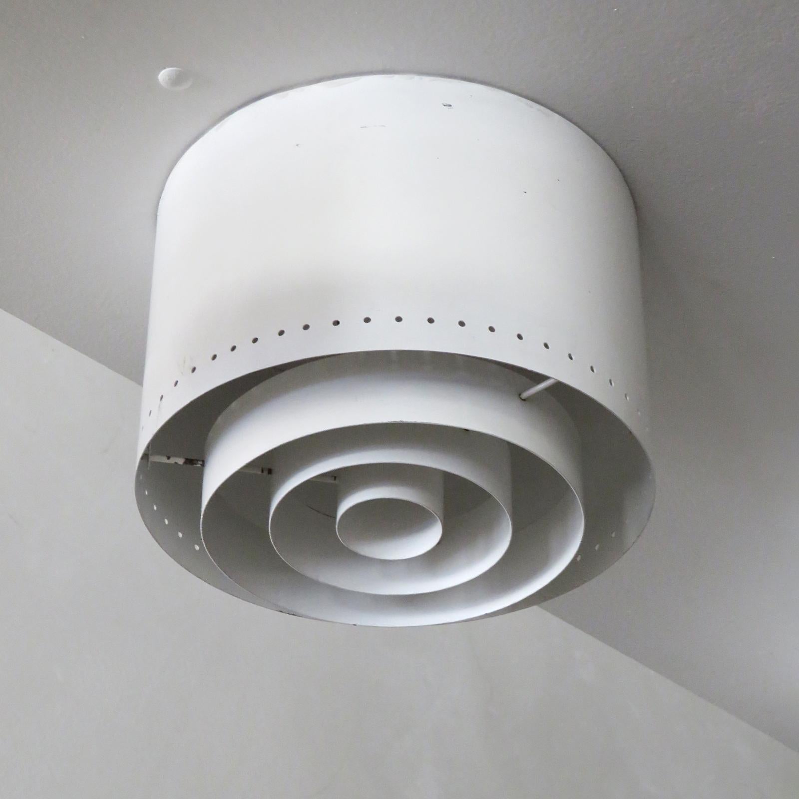 Elegant cylindrical white ceiling flush mounts model 'AE 97/25' by Itsu, Finland, 1960s, perforations along the bottom edge, with a detachable set of three circular diffusers, wired for US standards, one E27 socket per fixture, max. wattage 100w