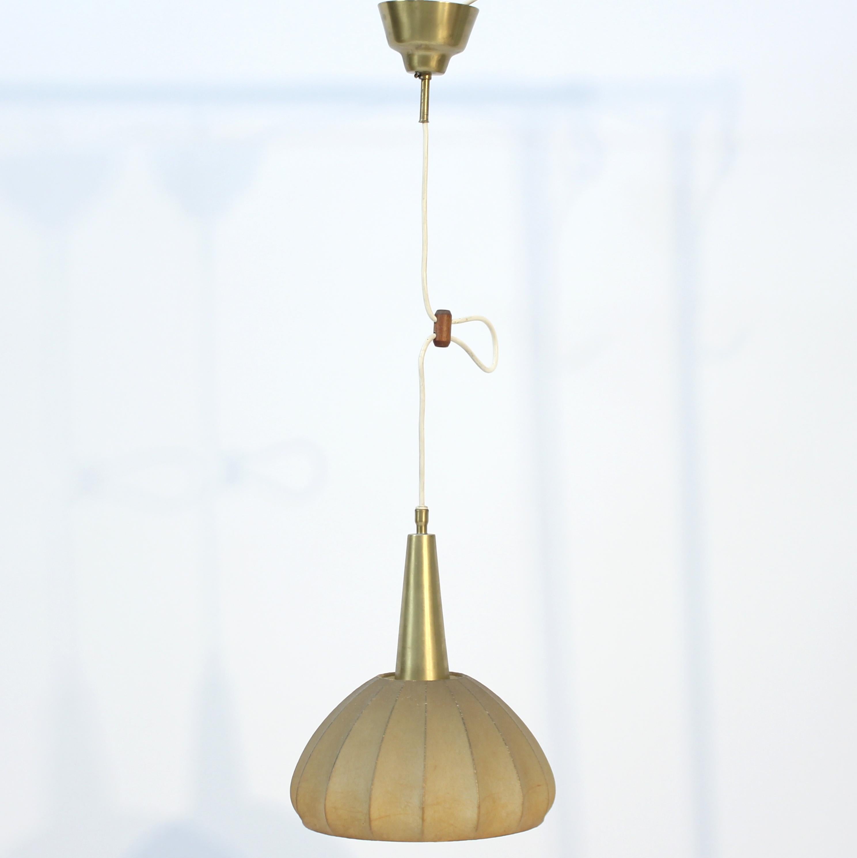 Rare ceiling lamp attributed to Hans Bergström for Ateljé Lyktan. Brass ceiling cup made by Ateljé Lyktan with its unmistakable shape. Brass rod that holds the 
