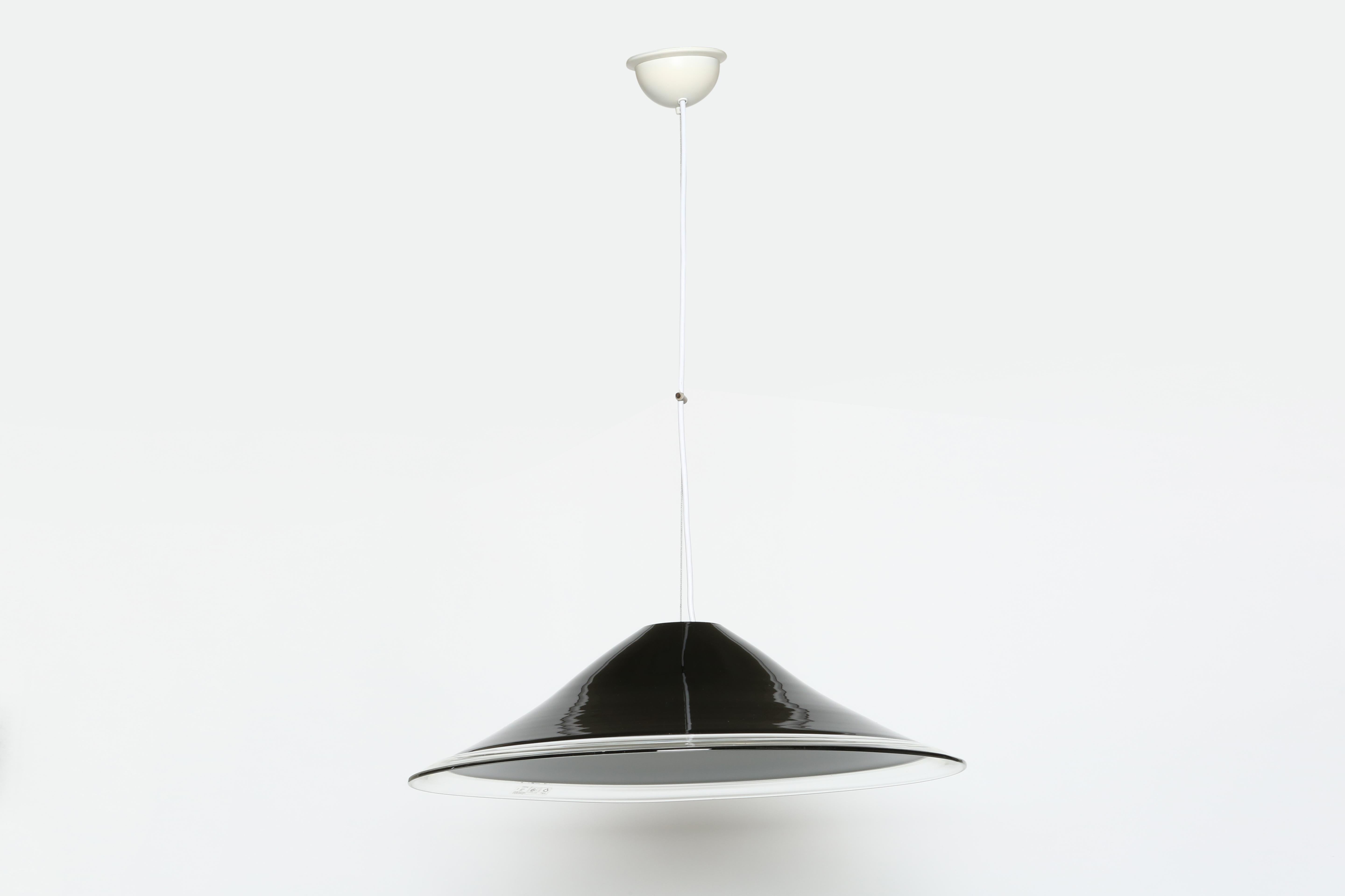 Ceiling pendant by Renato Toso for Leucos.
Made in Italy in 1960s.
Murano glass black on the top and white inside the shade with a clear edge.
Very heavy impressive glass.
Rewired for US
4 pendants available. Priced per item.

We take pride in