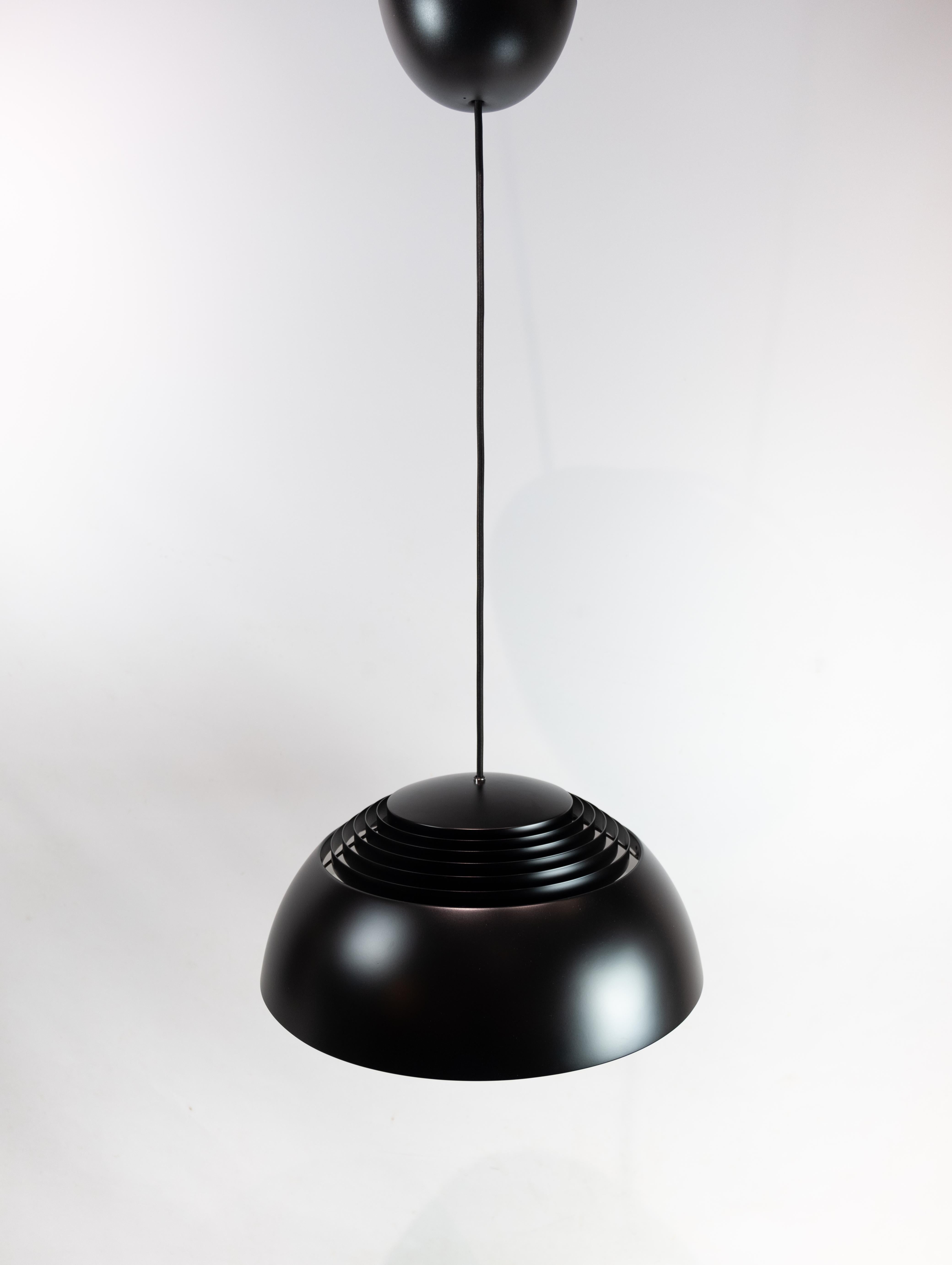 Ceiling pendant, Royal, in black metal designed by Arne Jacobsen and manufactured by Louis Poulsen. The lamp is in great vintage condition.