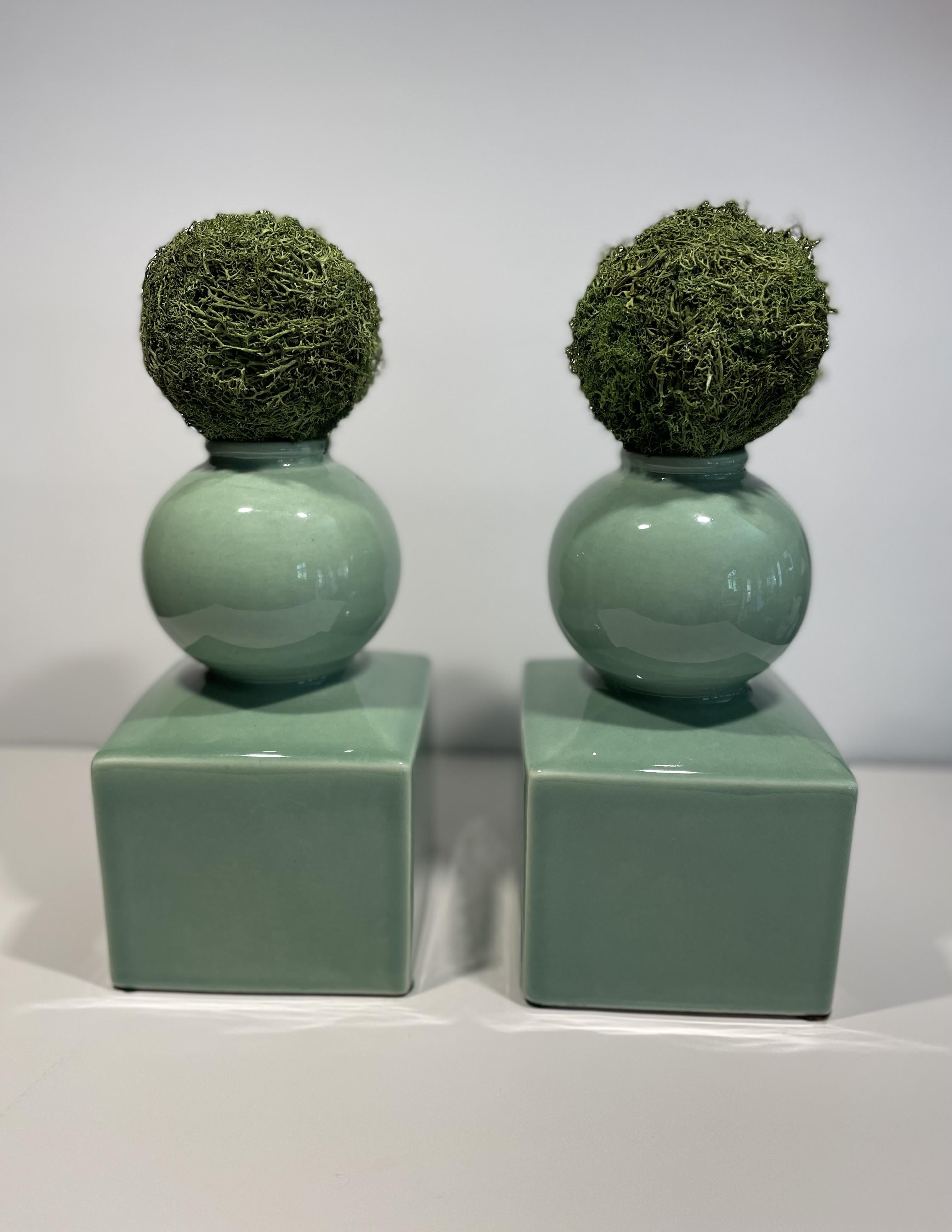 Love this pair of vases or bookends, attributed to Serena & Lily. They are beautifully proportioned and well-weighted. The glazed ceramic has a bit more hint of blue in the color, than these photos seem to show. There is something very pleasing in a