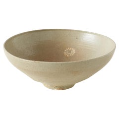 Celadon-Glazed Bowl with Stylized Floral Decoration
