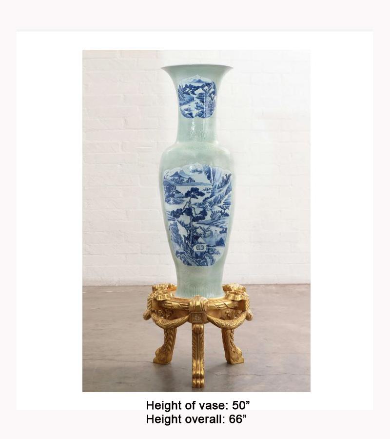 An impressive Celadon glazed porcelain vase.
Second half of the 20th century.
The large Celadon vase is with two large central panels depicting a blue and white coastal scene with mountains and several Chinese figures, the neck is depicts a smaller