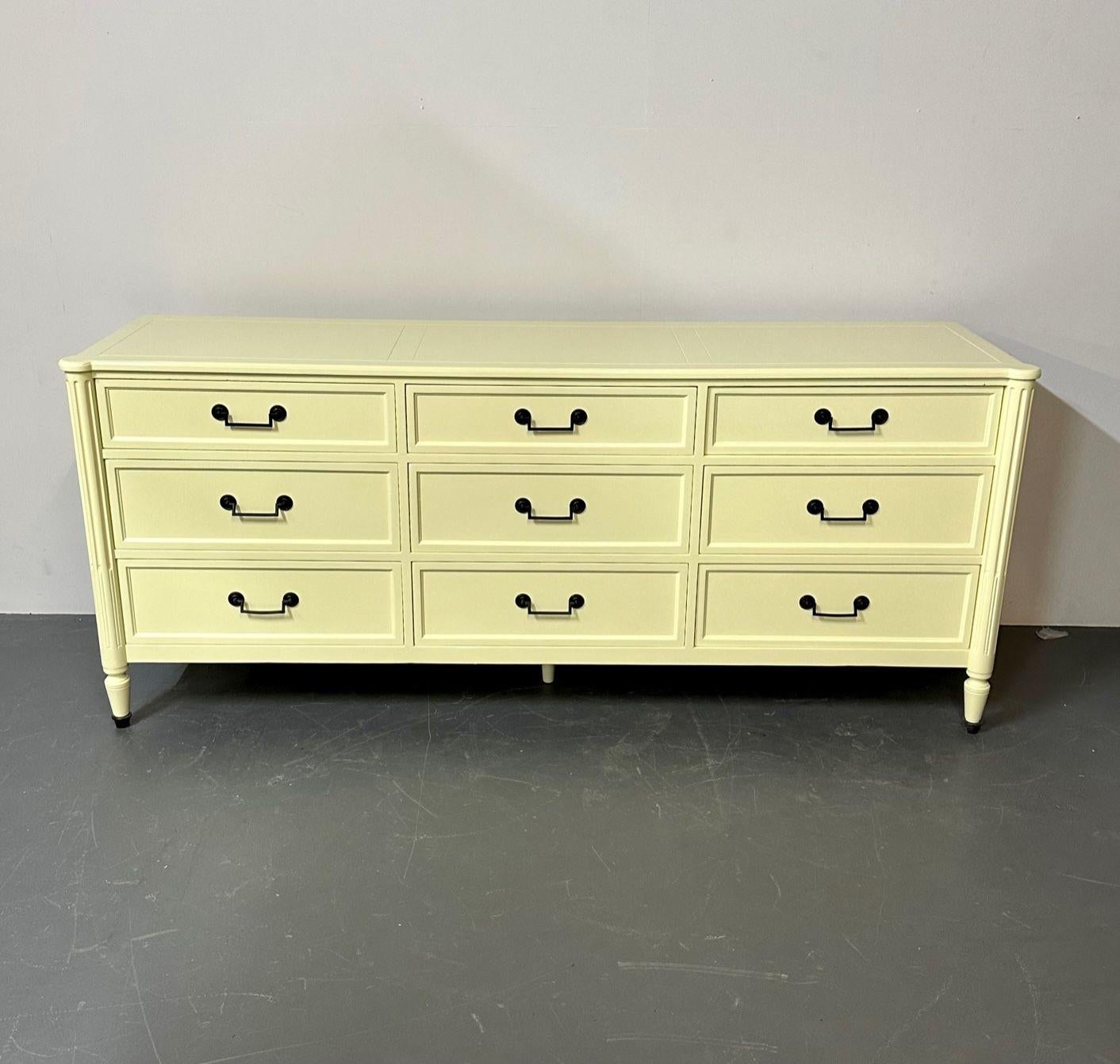 Celadon green dresser / sideboard by Baker, brass handles, Refinished, Regency.
A fine Baker Furniture company, chest in the very popular celadon green with brass drawer pulls done in a complimentary ebony. The case having nine drawers all which
