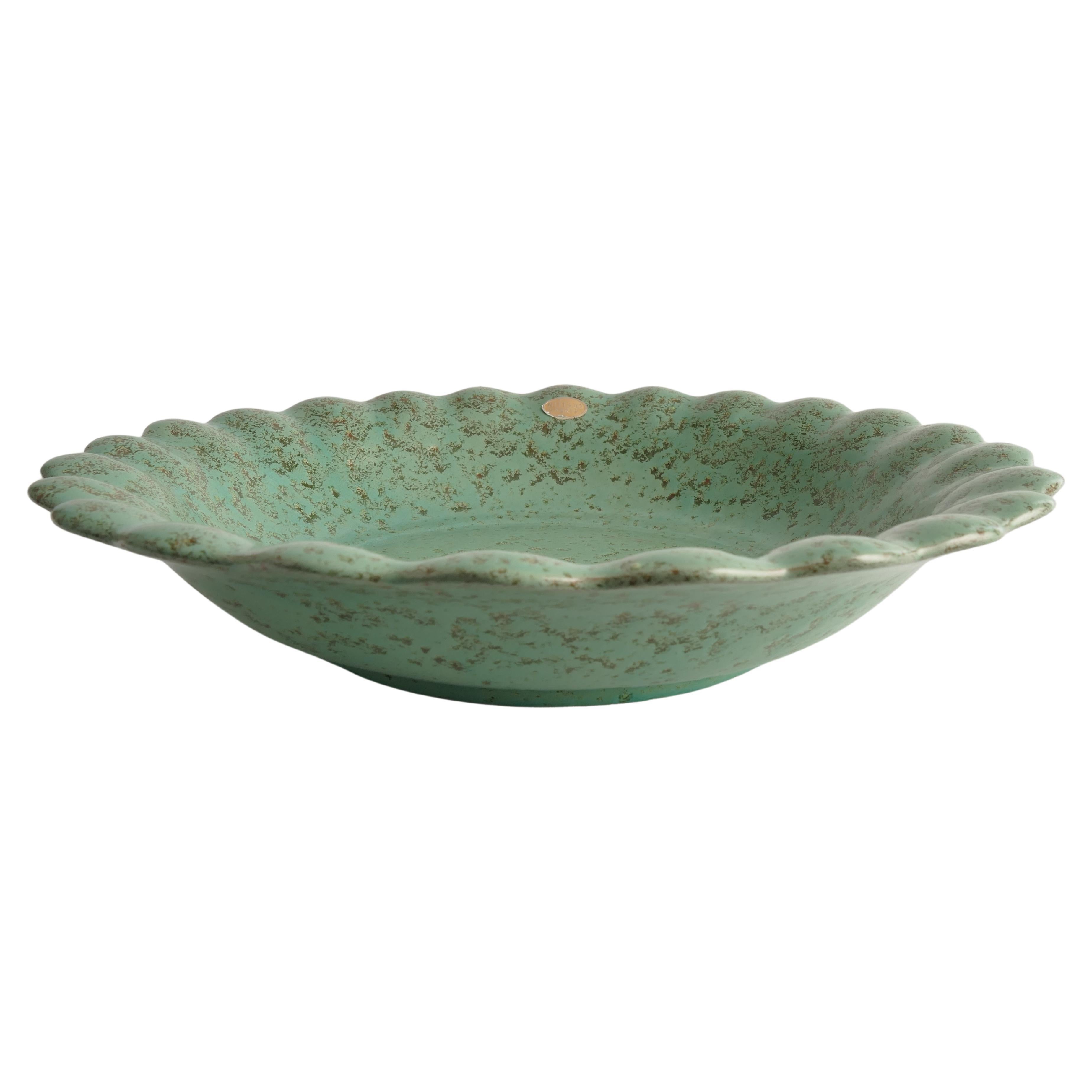 This collection comprises an elegant ensemble from Nittsjö, featuring exquisite celadon green dishes with a classic structure. Each element, from the grandeur of the large bowl to the delicate plates, reflects the meticulous craftsmanship that has