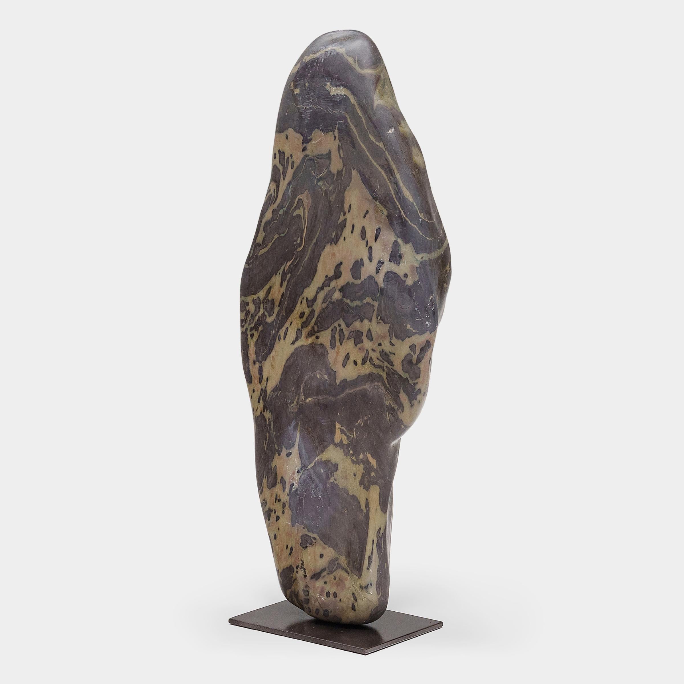 A well-chosen stone is the focal point of both a traditional Chinese garden and a scholar's studio - evoking the complexities of nature and inspiring creative thought. This sculptural meditation stone has an oblong silhouette with sloping curves,