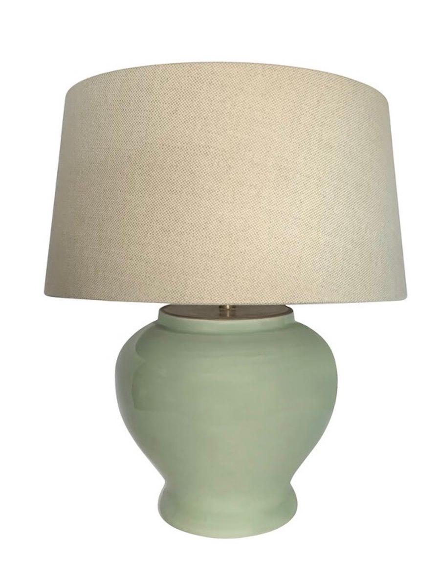 Contemporary Chinese pair small ginger jar shaped celadon lamps.
Linen shades included.
Base measures 8.5