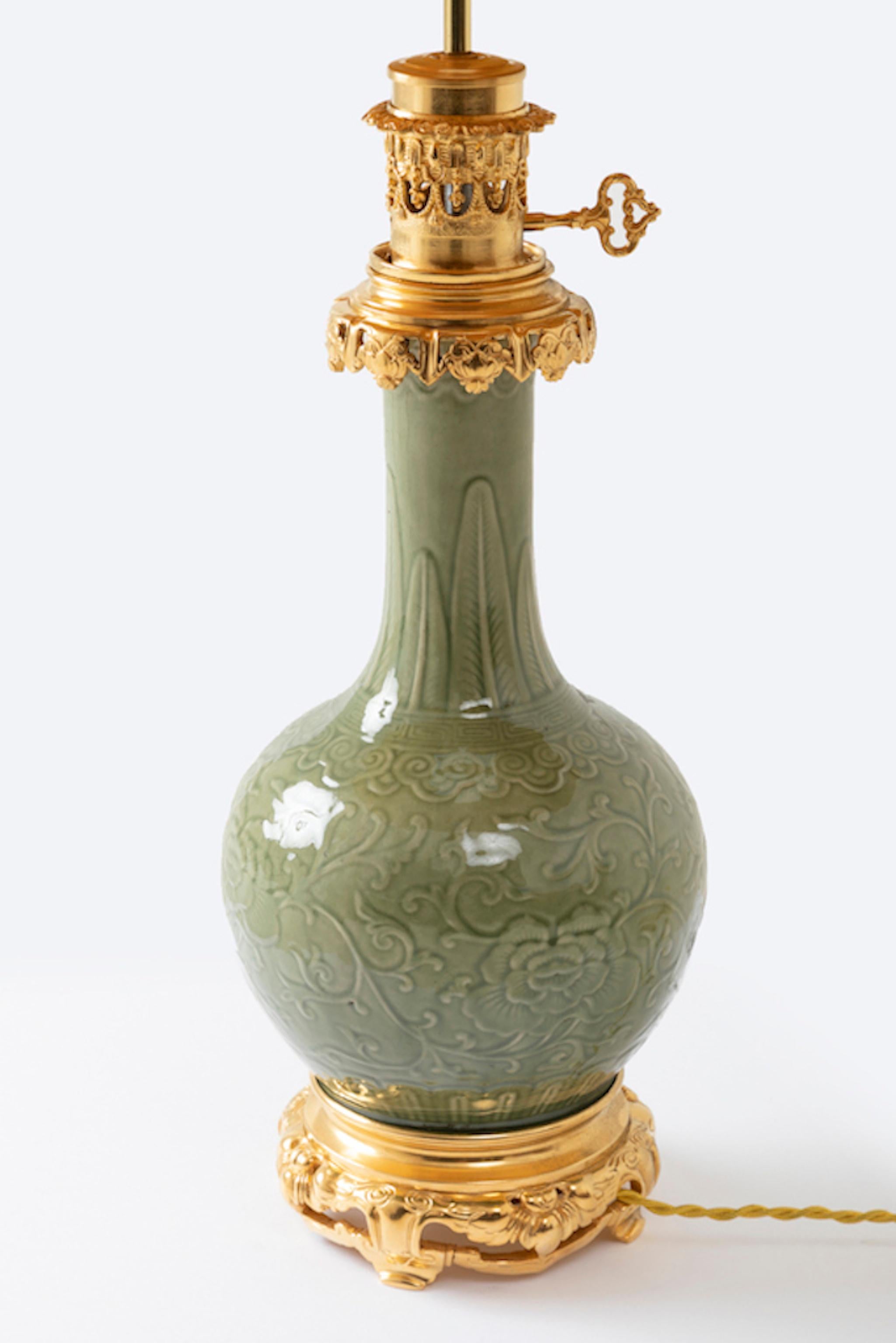Unknown Celadon Porcelain Lamp with a Relief Decor and Gilt Bronze Mount, circa 1880