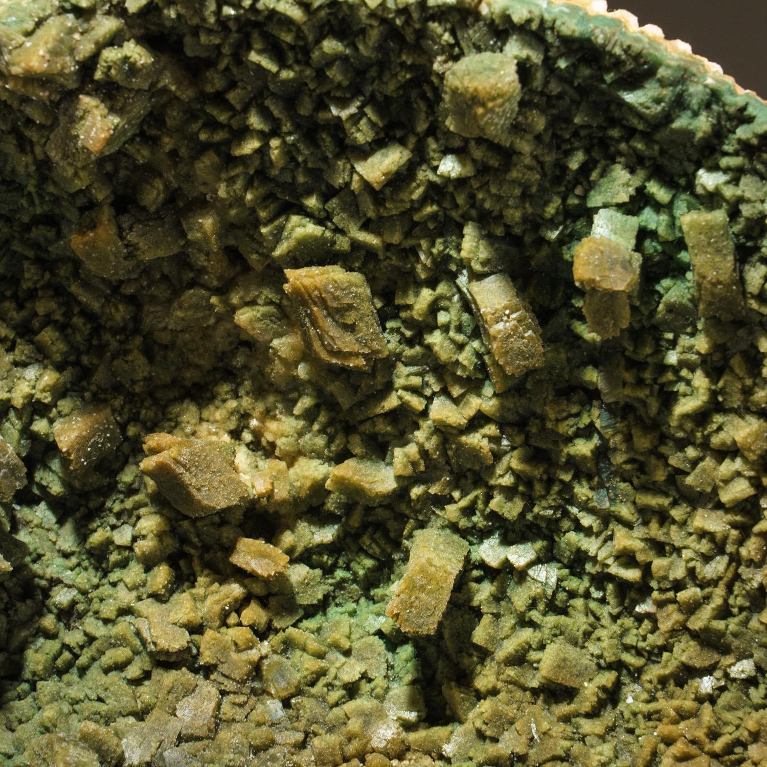 From Aurangabad, Maharashtra, India

Massive complex cluster of fully crystallized green heulandite in rosette-shaped rounded aggregates. The green coloration is due to microscopic celadonite inclusions.


7.4 lbs, 12 x 7.5 x 3 inches