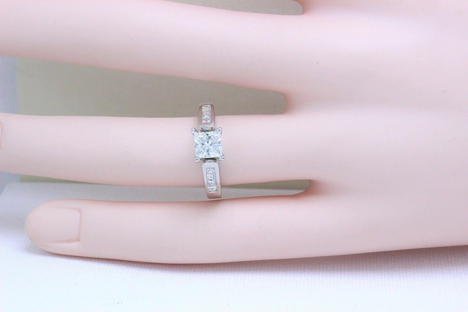 Celebration 18 Karat White Gold Diamond Ring Princess Cut 1.25 Carat F SI1 For Sale 3