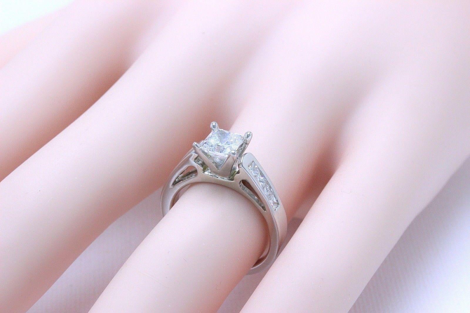 Celebration 18 Karat White Gold Diamond Ring Princess Cut 1.25 Carat F SI1 For Sale 4