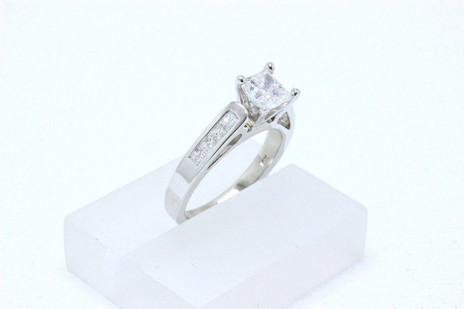 Celebration 18 Karat White Gold Diamond Ring Princess Cut 1.25 Carat F SI1 In Excellent Condition For Sale In San Diego, CA