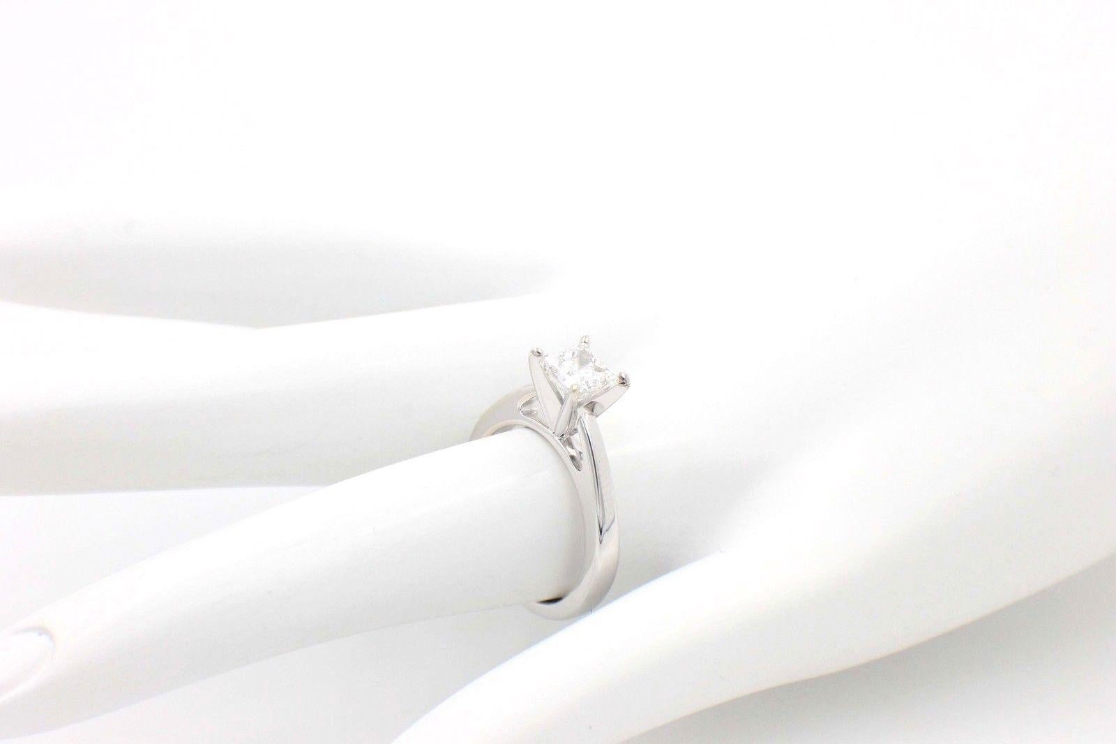 Women's Celebration Diamond Engagement Ring Princess 0.97 CTS H SI1 18 Karat White Gold For Sale