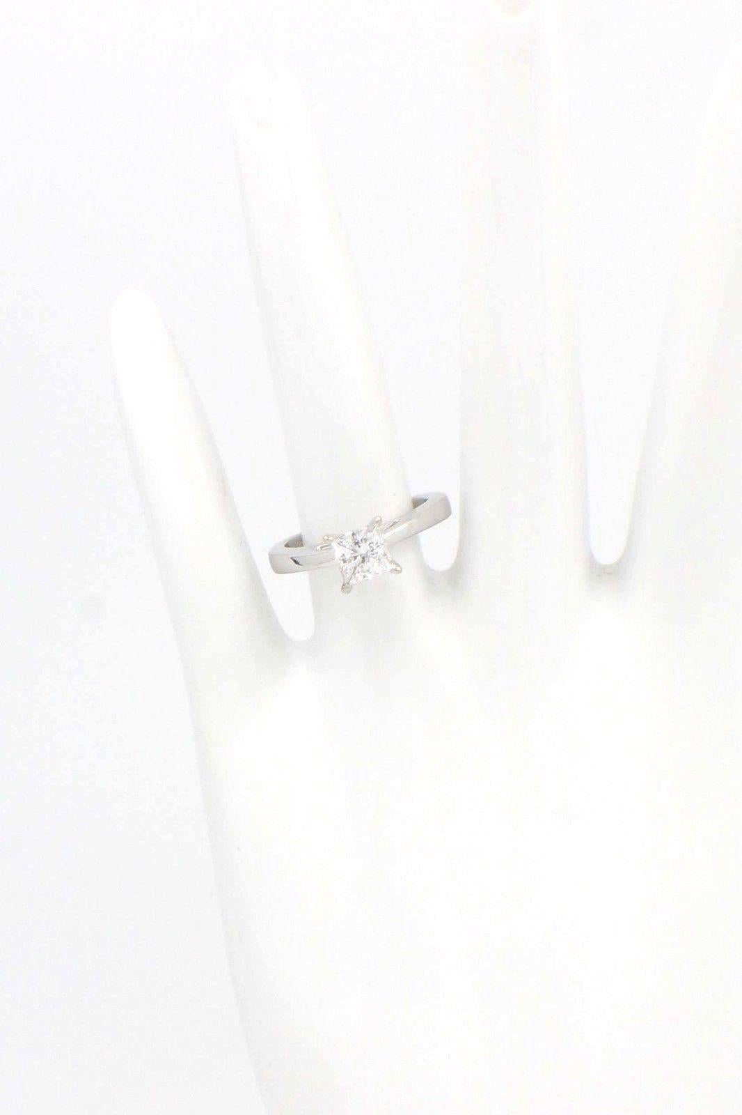 Celebration Diamond Engagement Ring Princess 0.97 CTS H SI1 18 Karat White Gold For Sale 1
