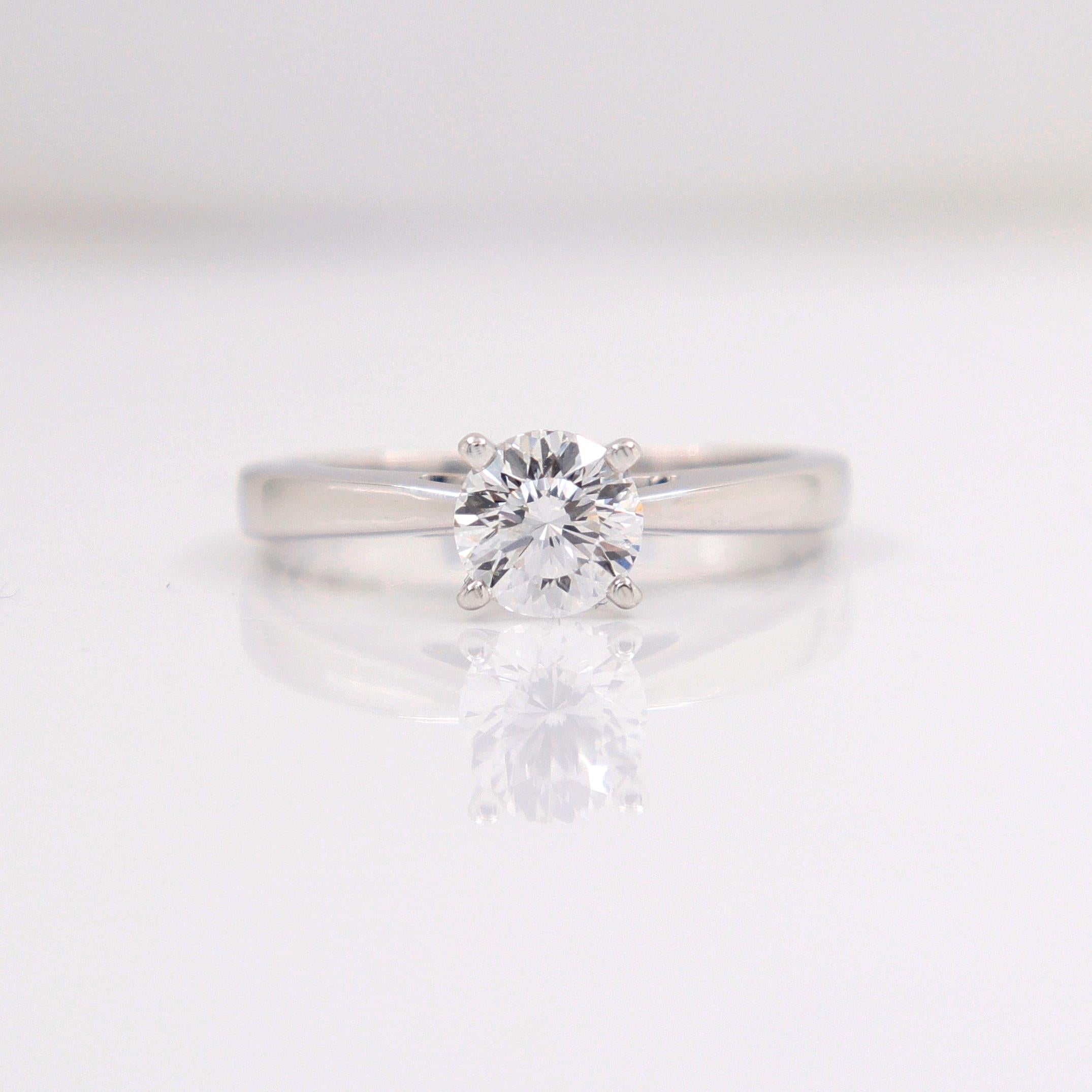 Round Cut Celebration Diamond Engagement Ring Round 0.97 Carat D SI2 18 Karat White Gold For Sale