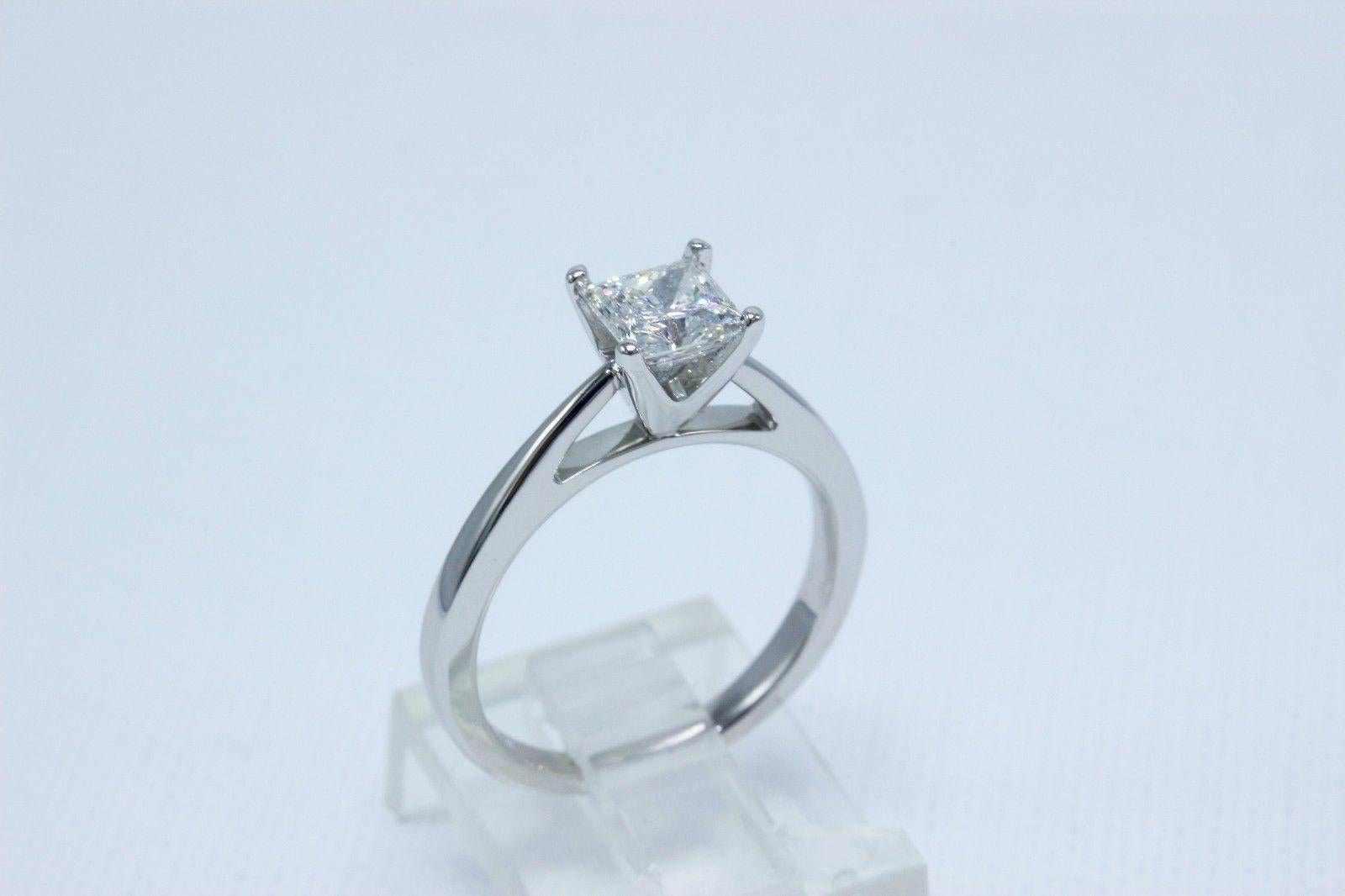 Women's Celebration Diamond Ring Princess Cut 0.97 Carat G SI2 18 Karat White Gold For Sale