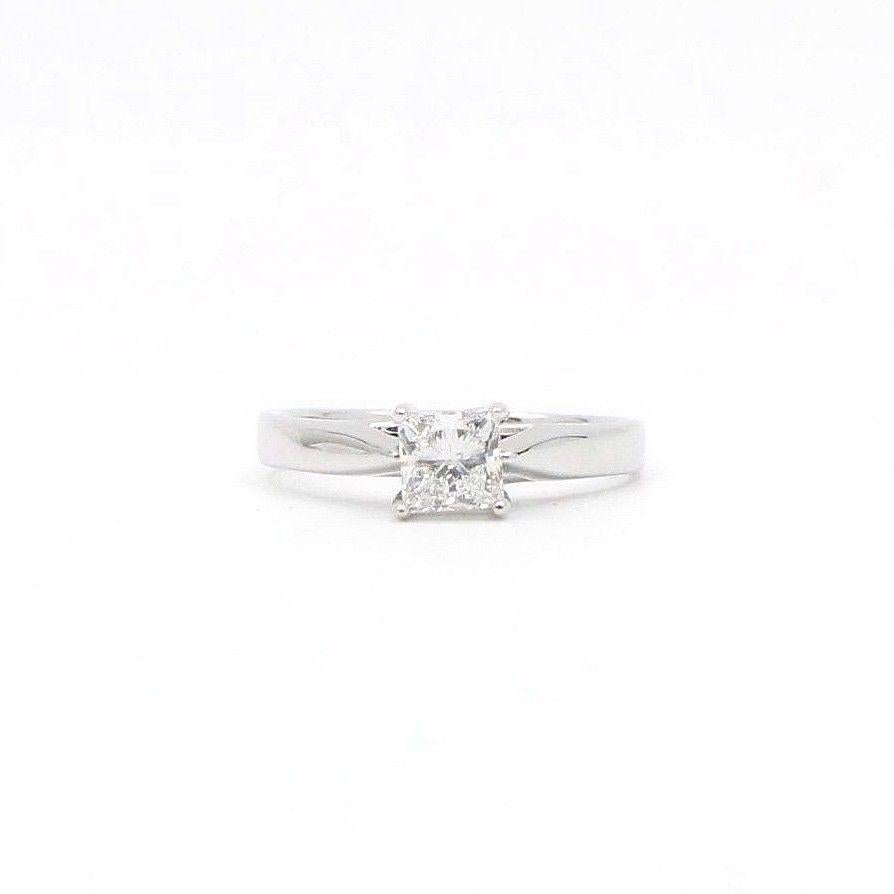 CELEBRATION GRAND DIAMOND
Style:  Solitaire Engagement Ring
Serial Number:   GSL#817765
Metal:  14KT White Gold
Size:  9.75 - Sizable
Total Carat Weight:  1.00 CTS
Diamond Shape:  Princess Cut Diamond
Diamond Color & Clarity:  G / I1
Diamond