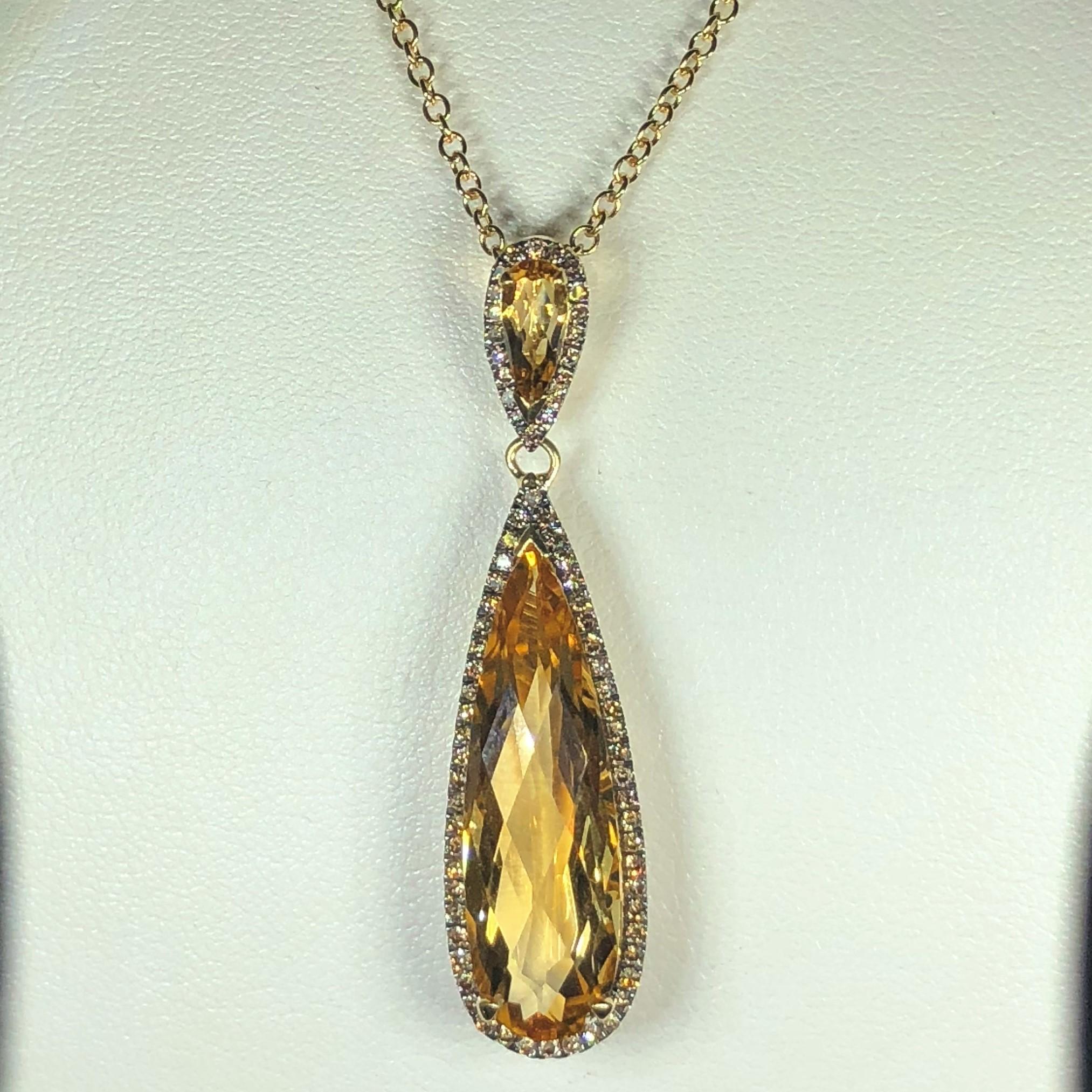 Celebrity 18 kt Yellow Gold Cognac Diamond and Citrine Drop Necklace. This beautiful pendant  is created in 18kt  yellow gold. The pendant is displayed on and sold in combination with an 18kt yellow gold 18' inch wheat link chain. Chain necklace has