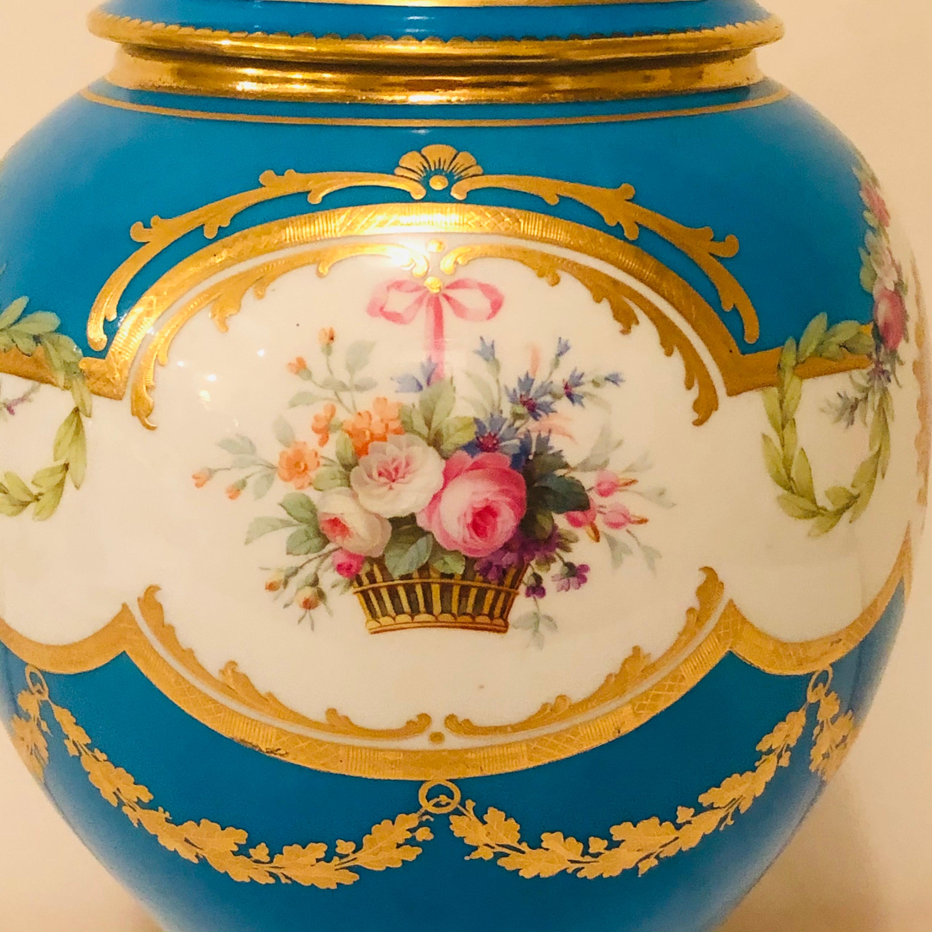 English Celeste Blue Minton Urn Painted with Cherubs and Flowers in the Style of Sèvres